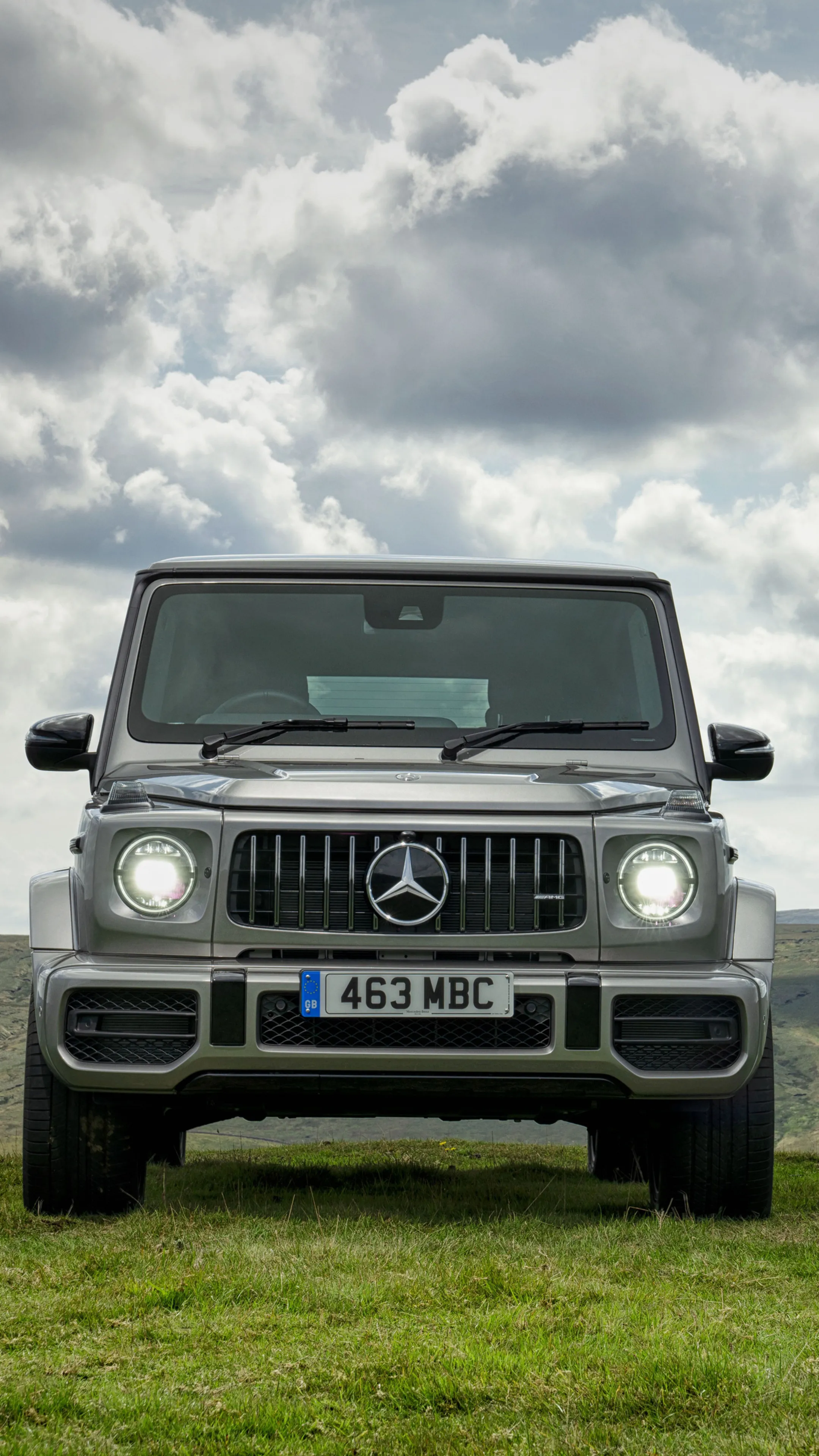 Front View of Mercedes Benz G Wagon with Clouds Wallpaper