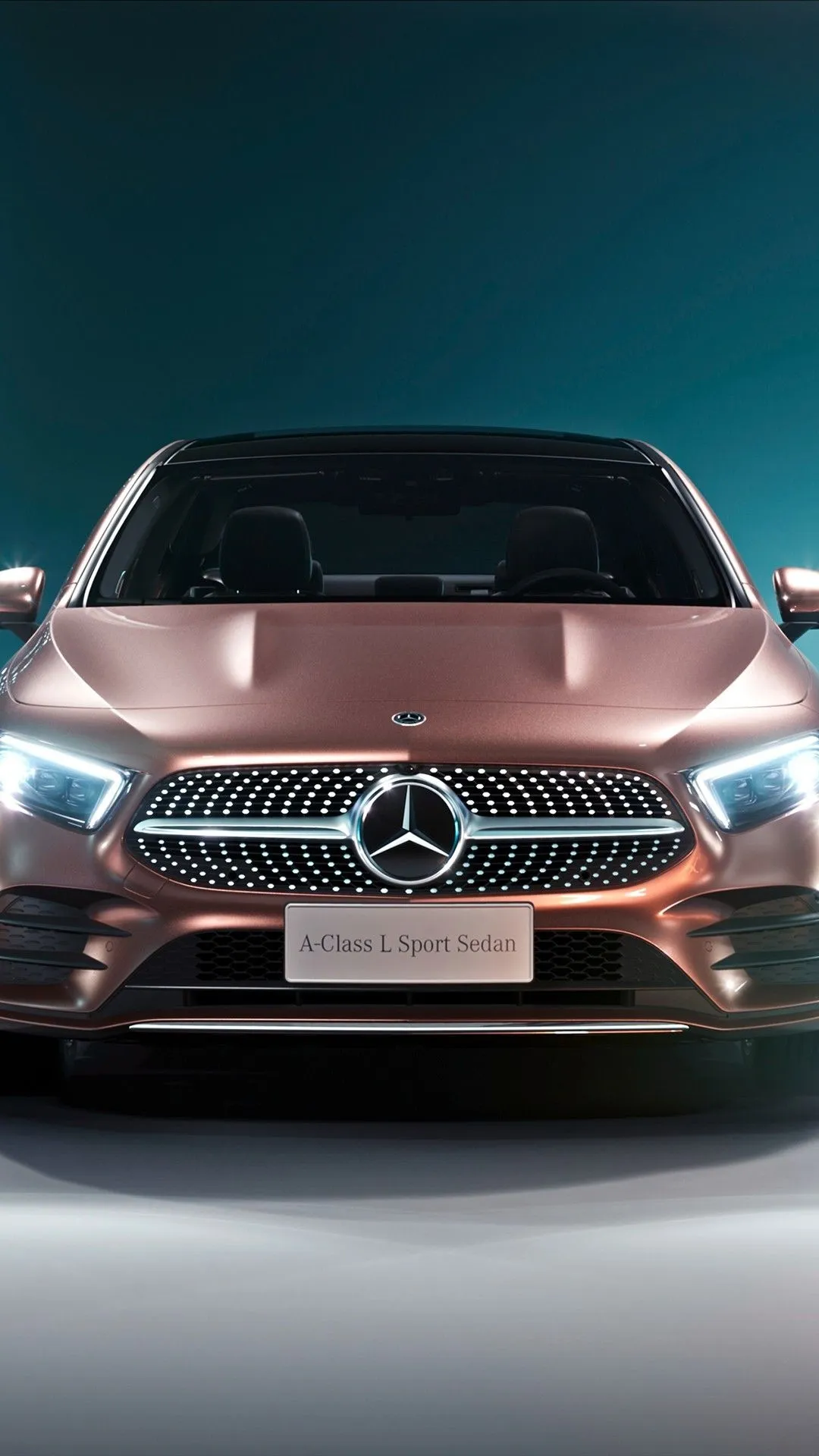 Front View of Modern Mercedes Benz Car with blue Headlights