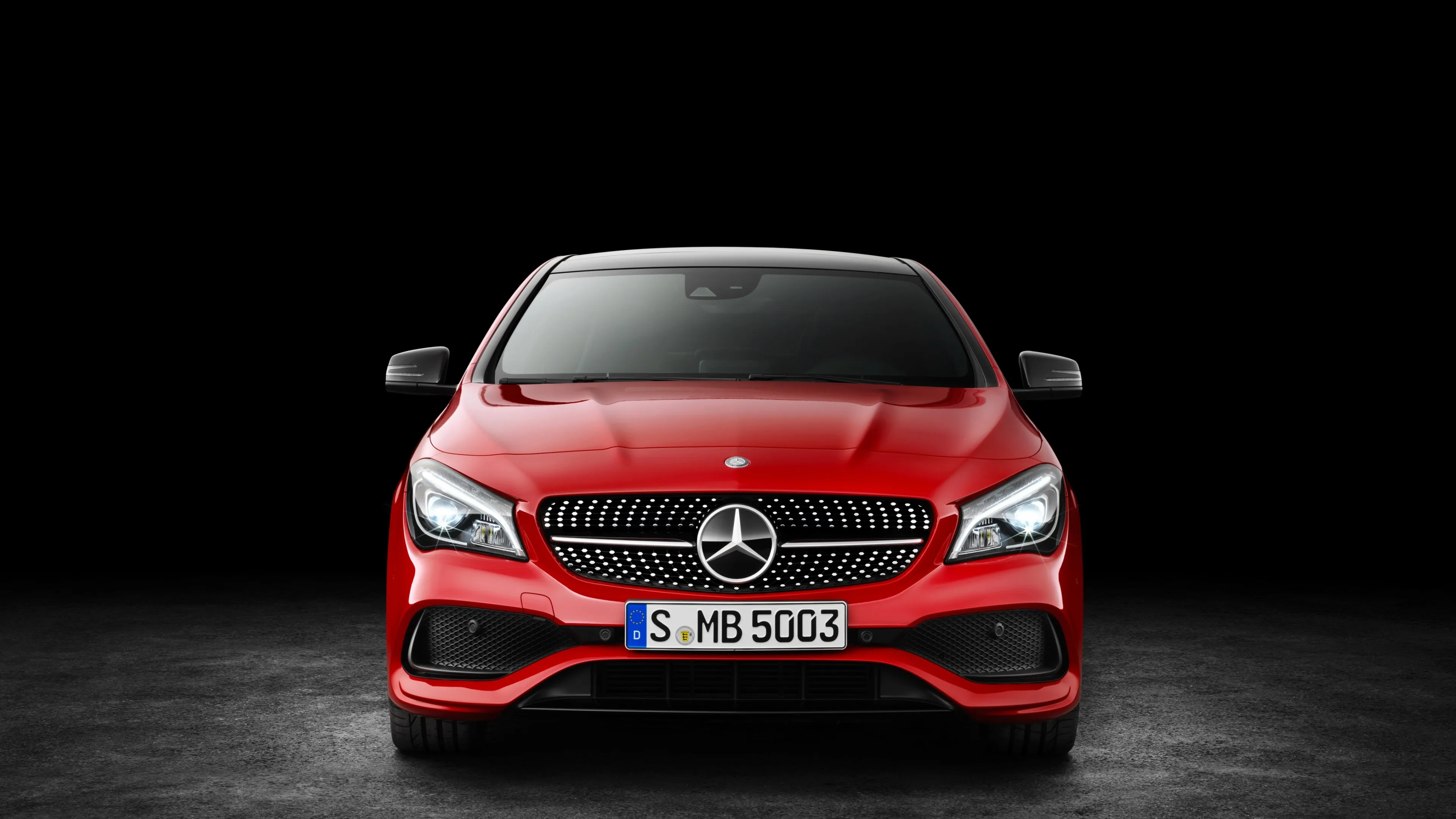 Front View Red Mercedes Benz Sports Car on Black Background