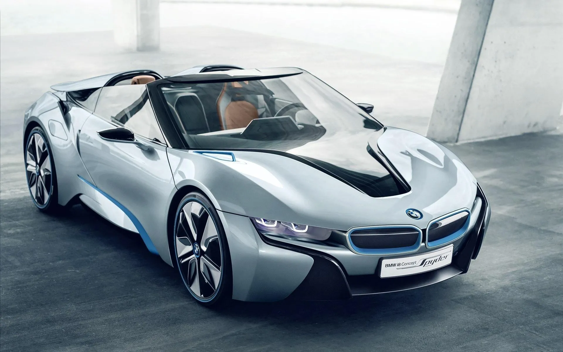 Futuristic Bmw I8 Concept Car in Modern Showroom Wallpaper