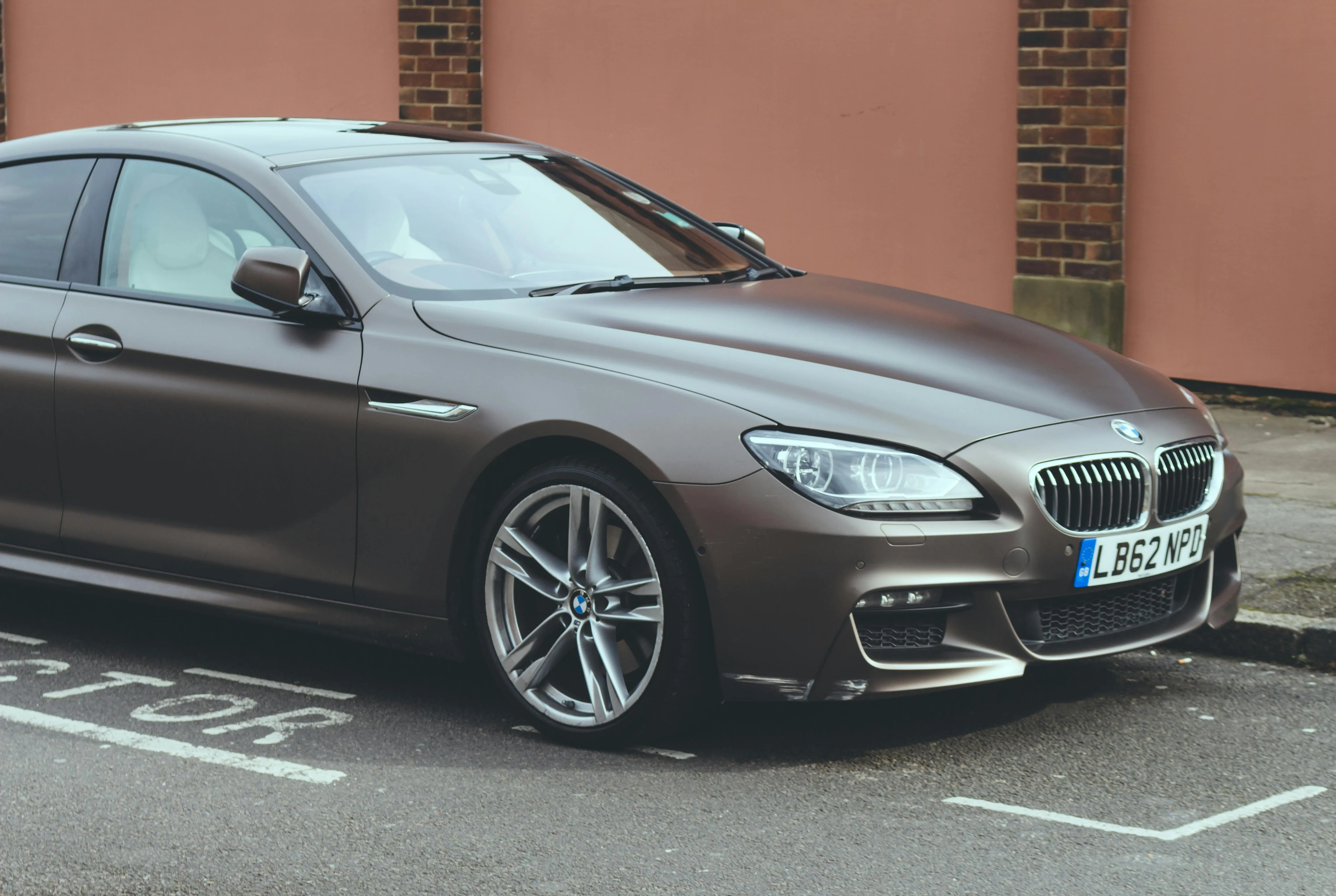 Gray Bmw Sedan Parked Outside Brick Wall in City Parking Hd