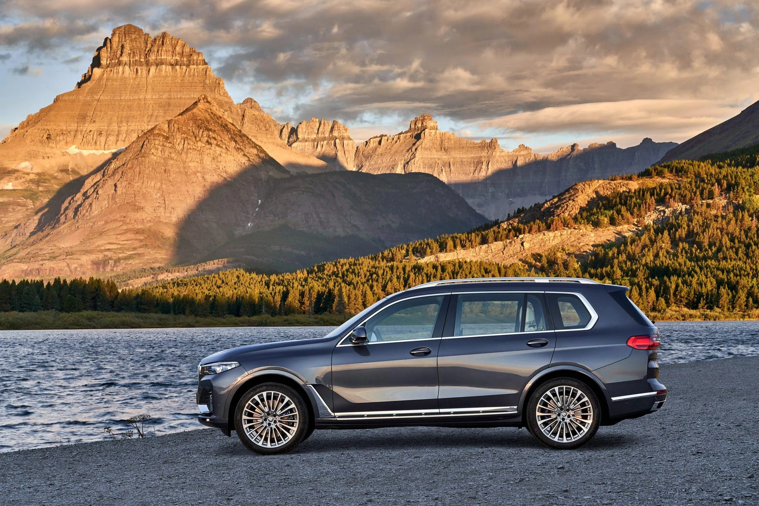 Gray Bmw Suv Parked By Lake with Mountain in the Back