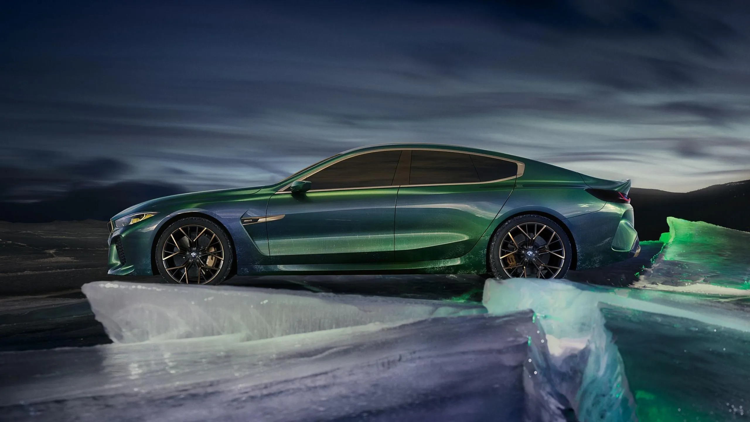 Green Bmw Car in a Dark Setting with Ocean Reflections
