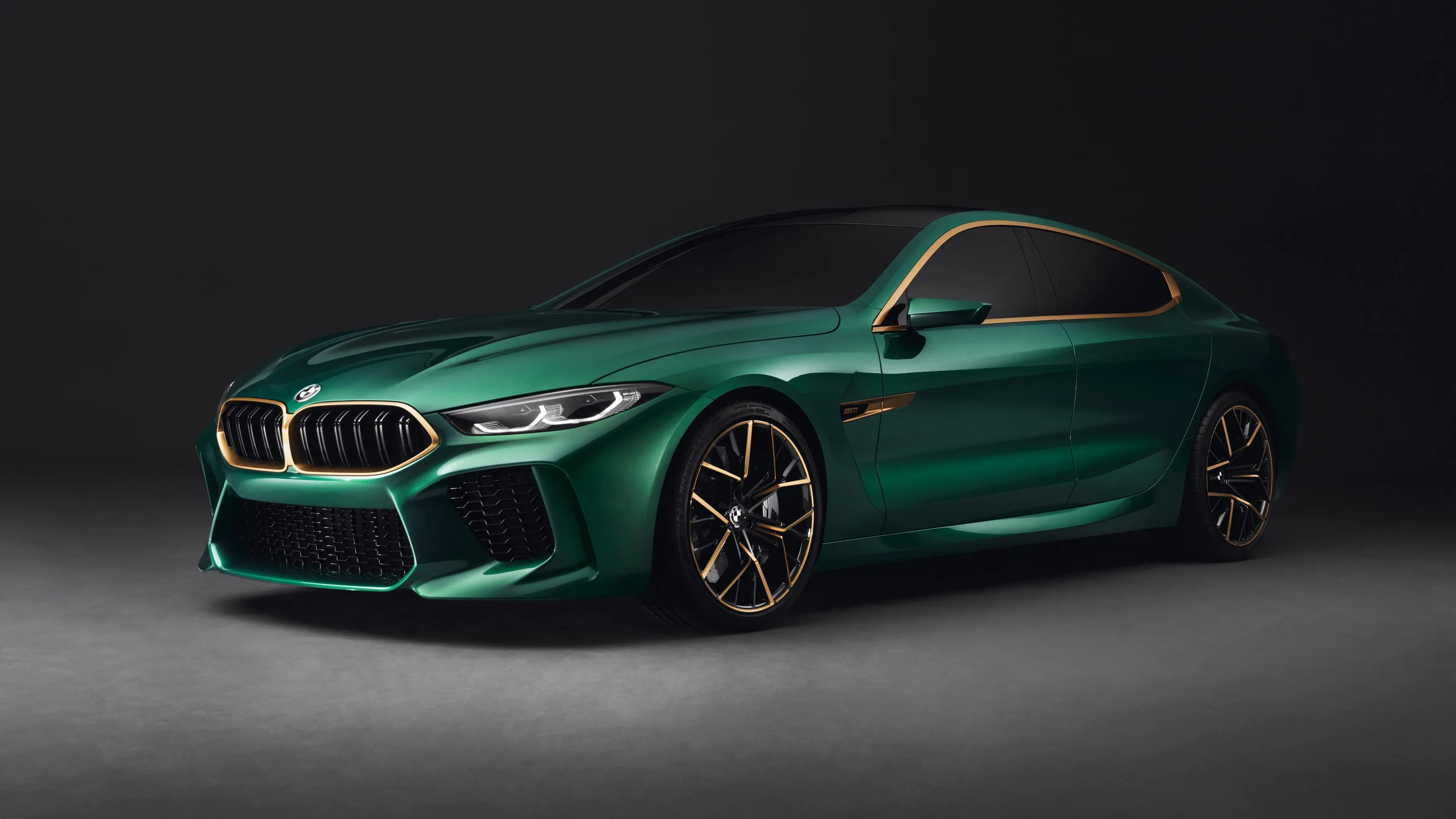Green Bmw Sports Coupe on Dark Background with Studio Light