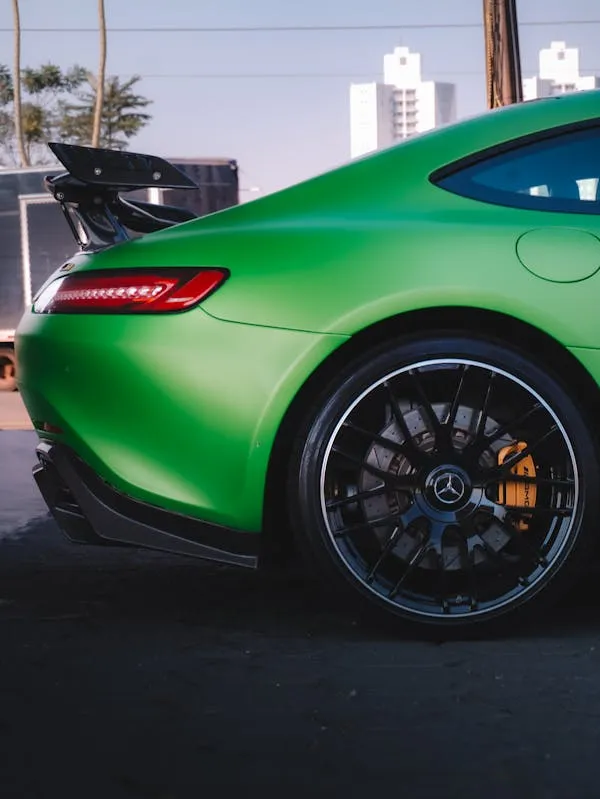 Green Mercedes AMG Rear Wheel and Spoiler Side View image
