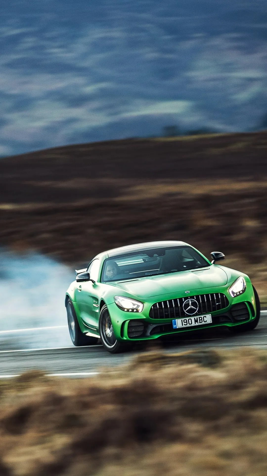 Green Mercedes Benz Sports Car Drifting on Track Wallpaper