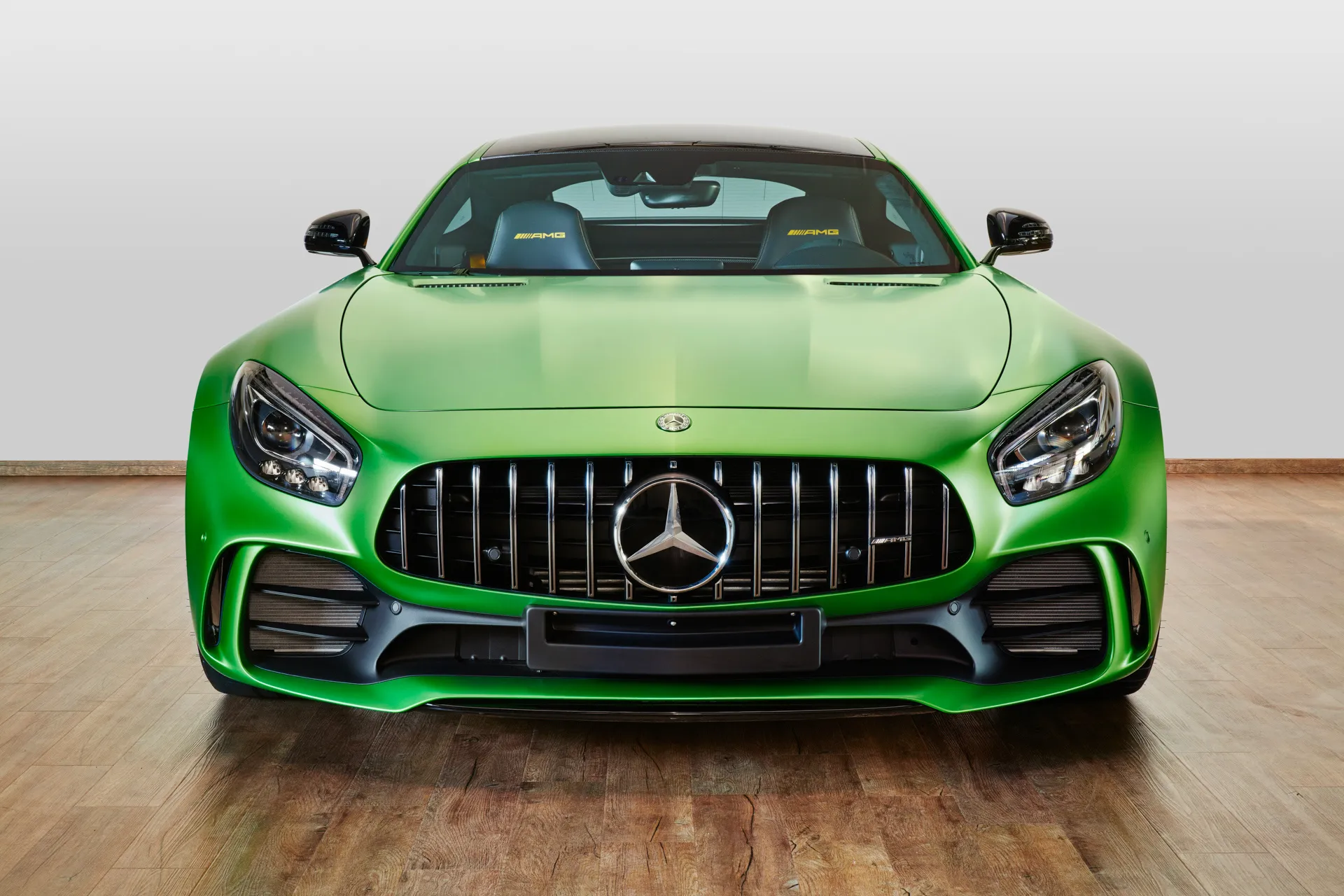 Green Mercedes Benz Sports Car Front Close Up in Showroom