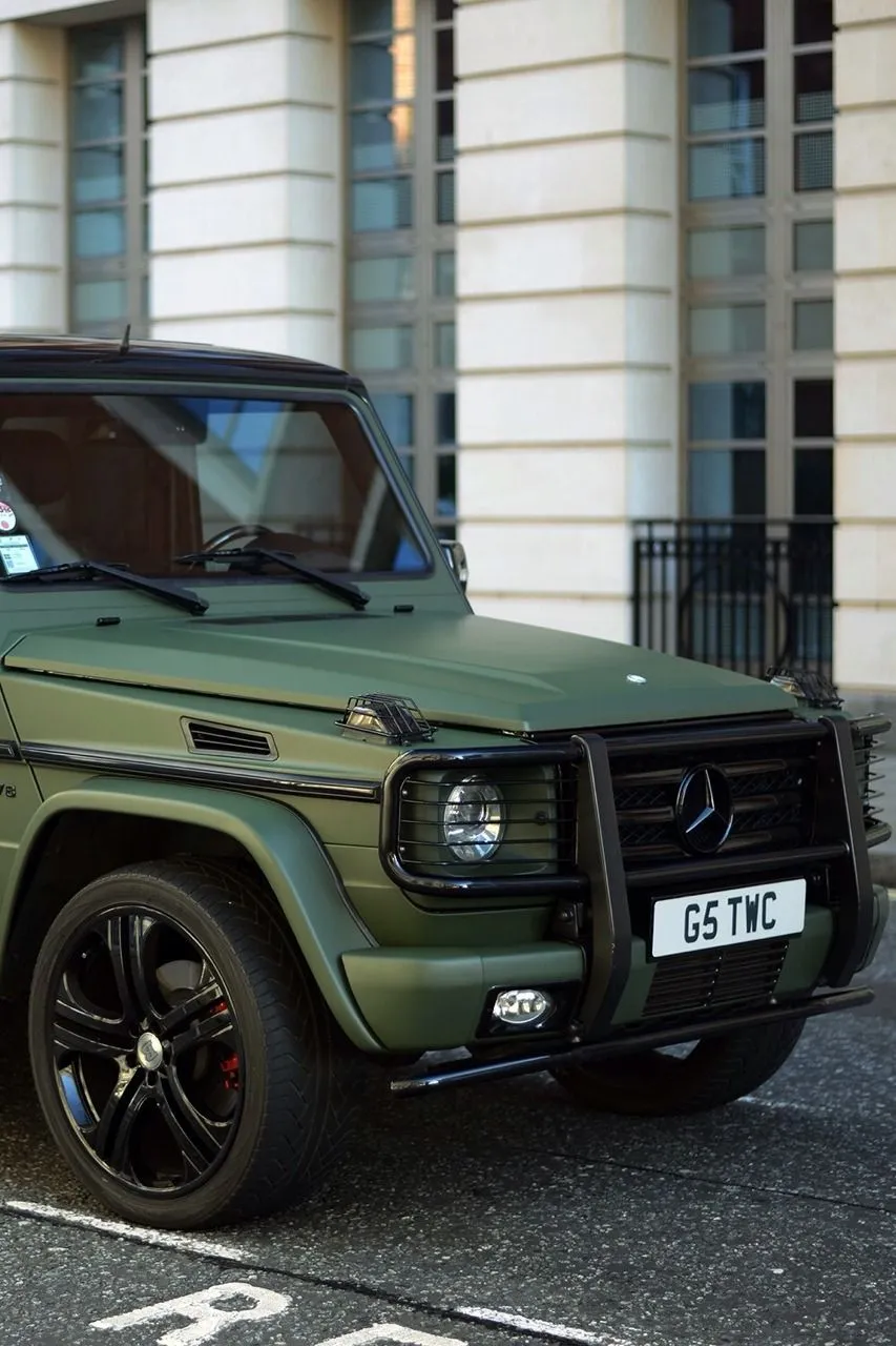Green Mercedes GClass Parked in Urban Setting HD Wallpaper