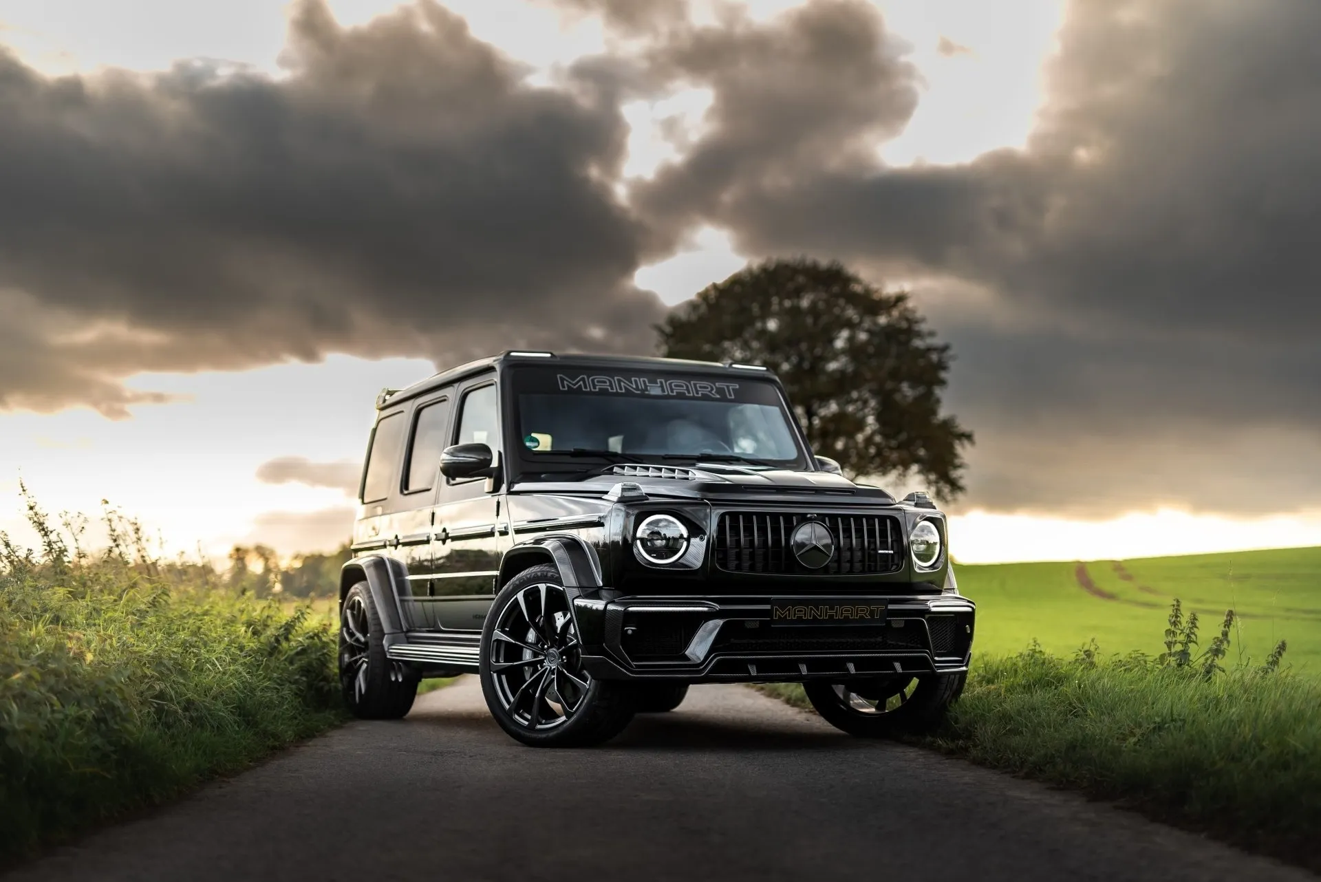 Iconic G Wagon Mercedes Shines Under Sunset Skies Wallpaper