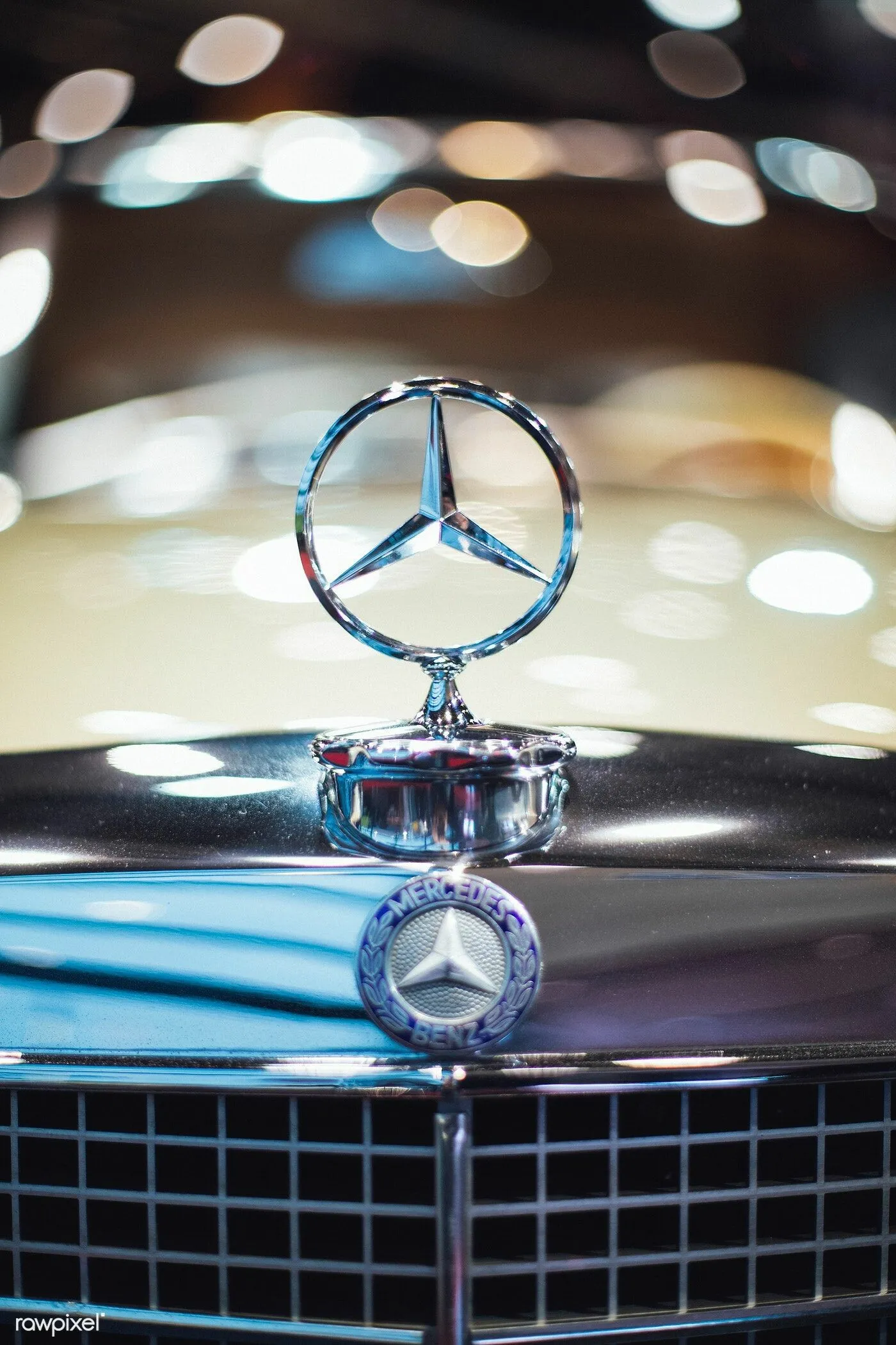 Iconic Mercedes Benz Logo on Classic Vehicle Hood Ornament