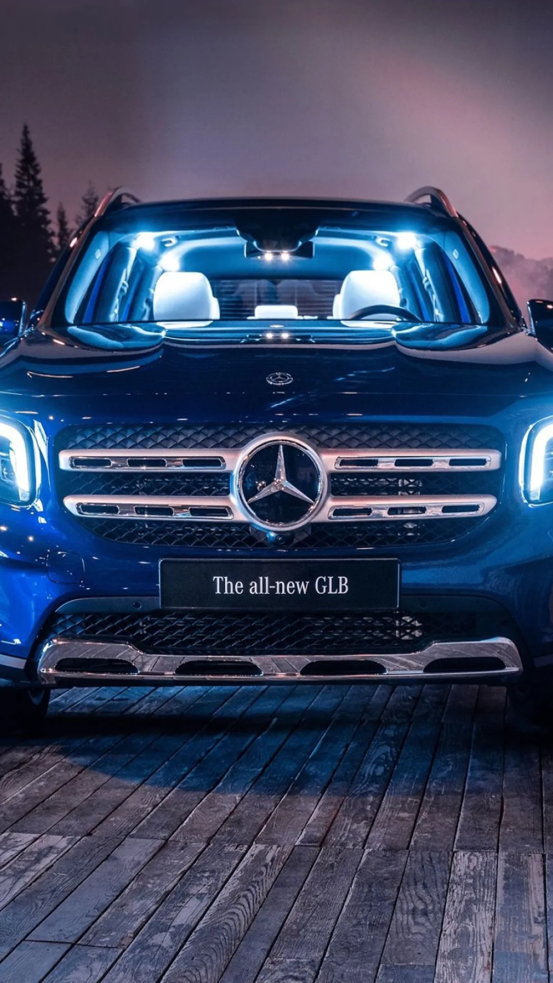 Illuminated Mercedes Front Grille Shot in Dim Lighting