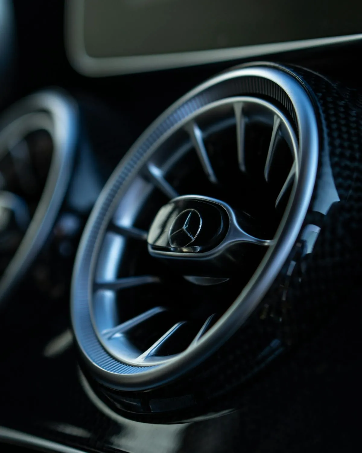Interior Close Up of Mercedes AC Vents and Dashboard