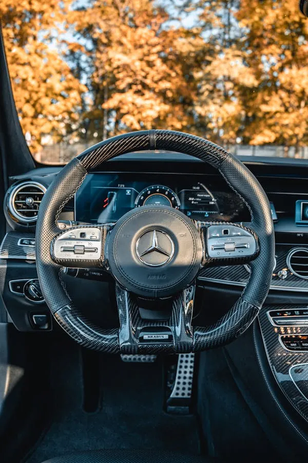 Interior View of Mercedes Benz Steering Wheel and Dash