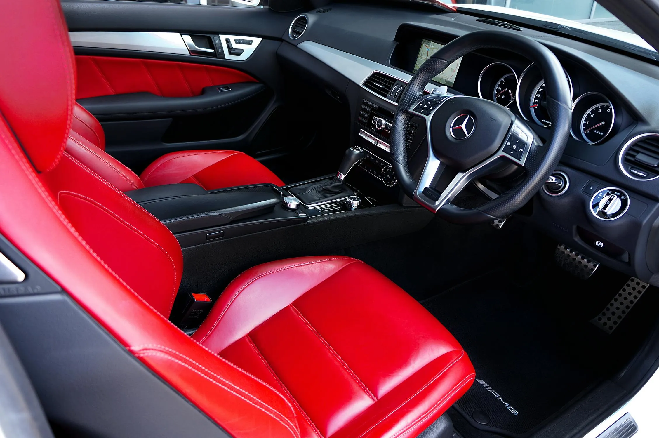 Interior View of Mercedes with Red Sport Seats Wallpaper 4K