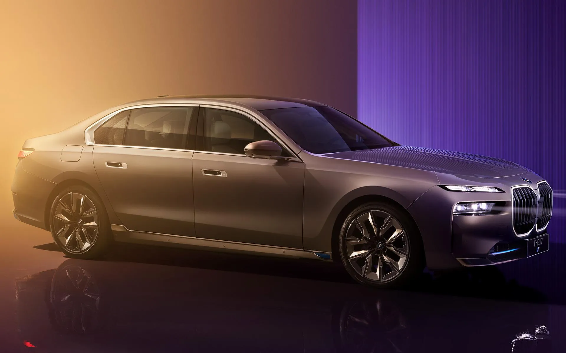 Luxury Bmw Sedan with Elegant Lighting on Display Wallpaper