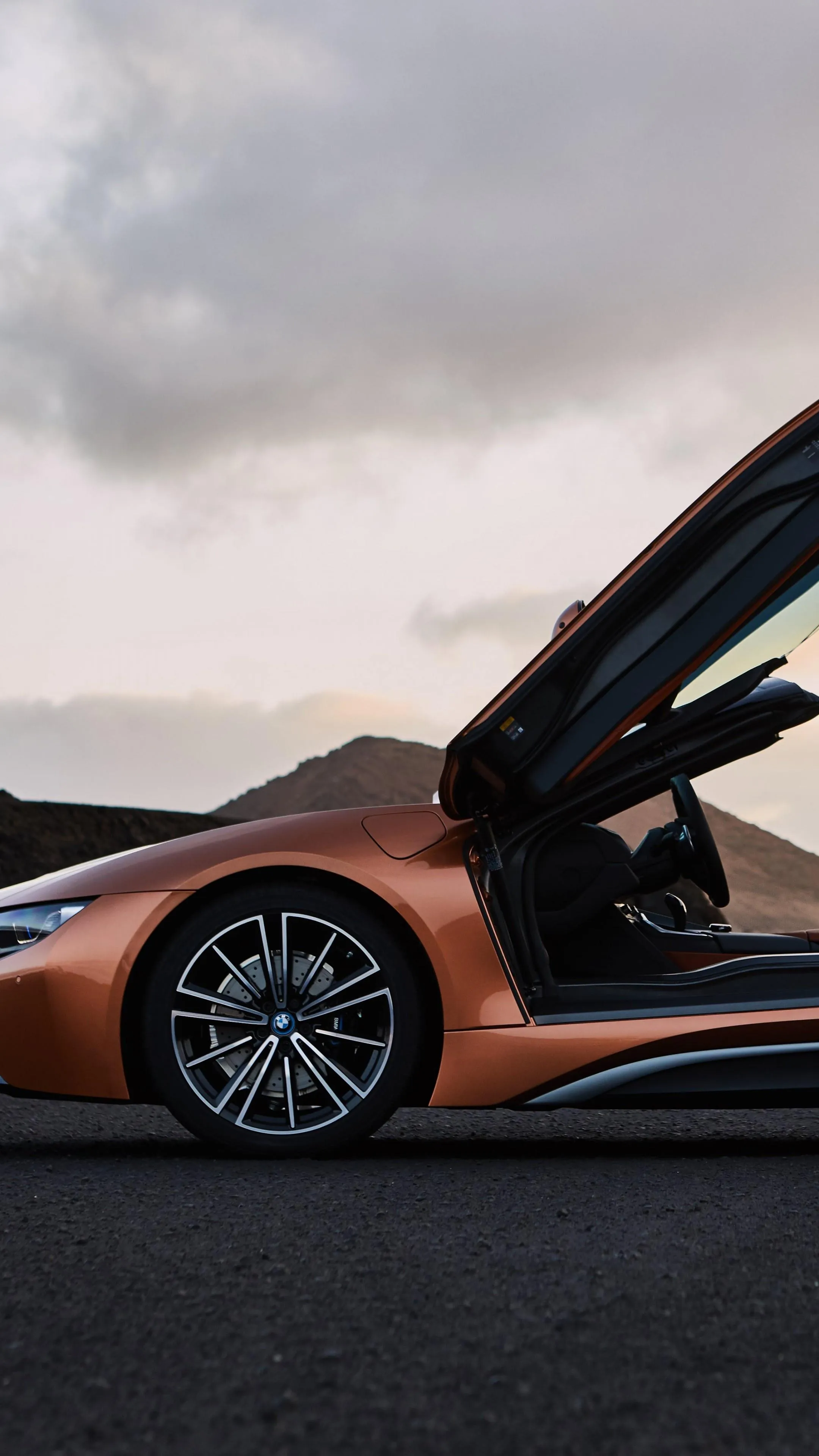 Luxury Bmw Sports Car with Doors Open in Natural Setting