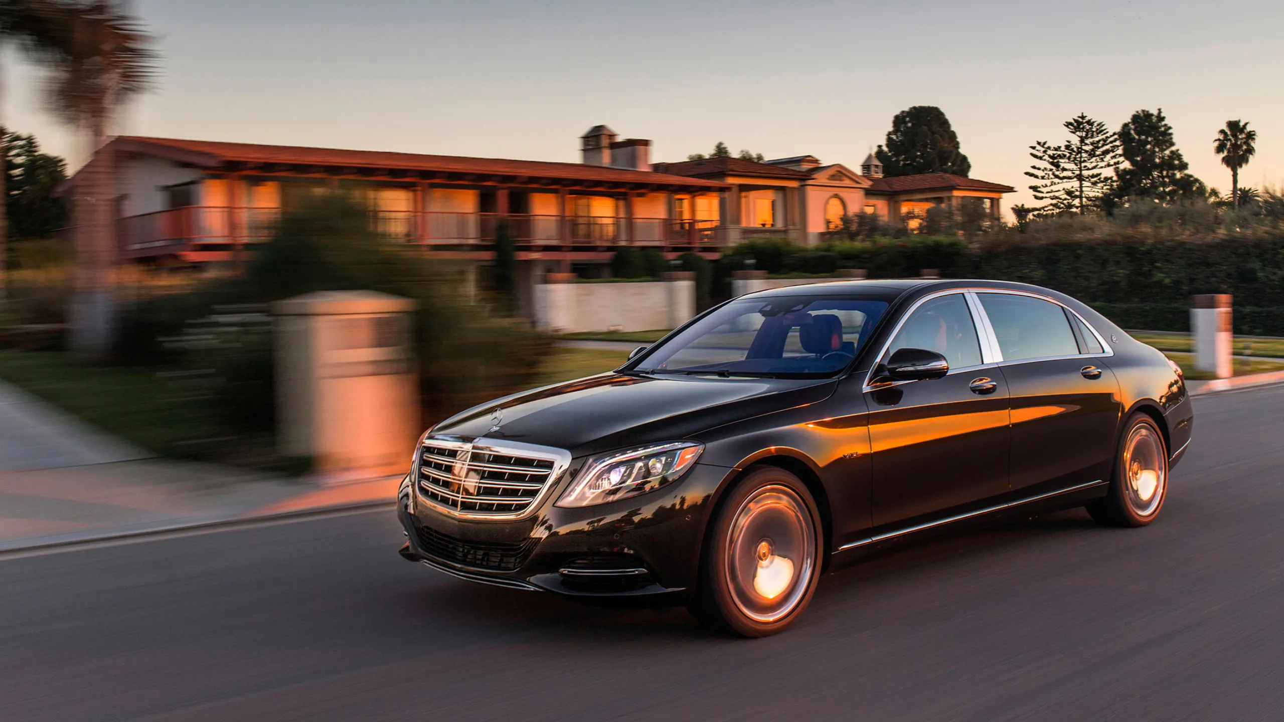 Luxury Mercedes Sedan Driving Through Elegant Suburbs
