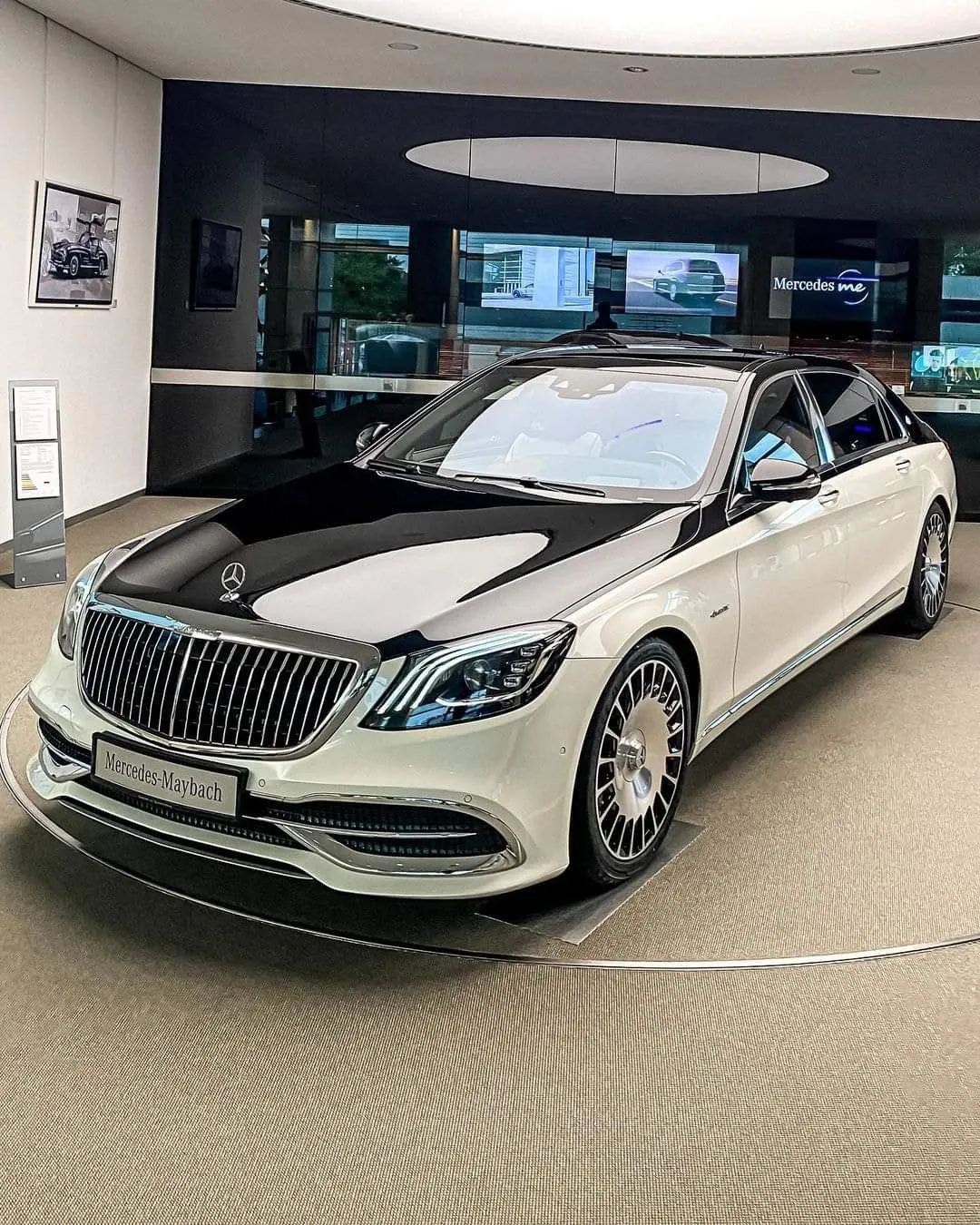 Luxury White Mercedes Benz Sedan Displayed Indoors image