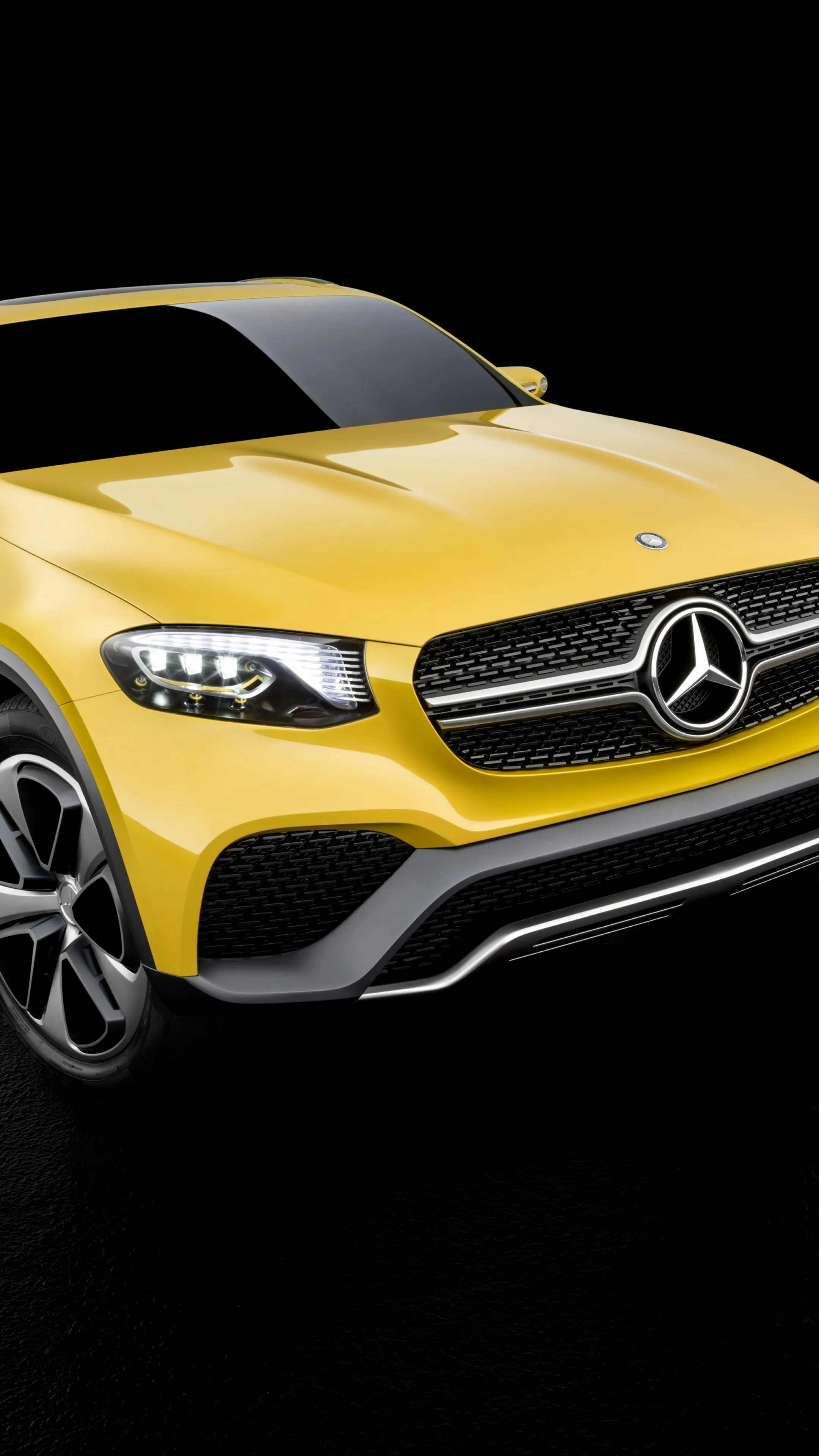 Luxury Yellow Mercedes Benz Car Showcased on Black Wallpaper