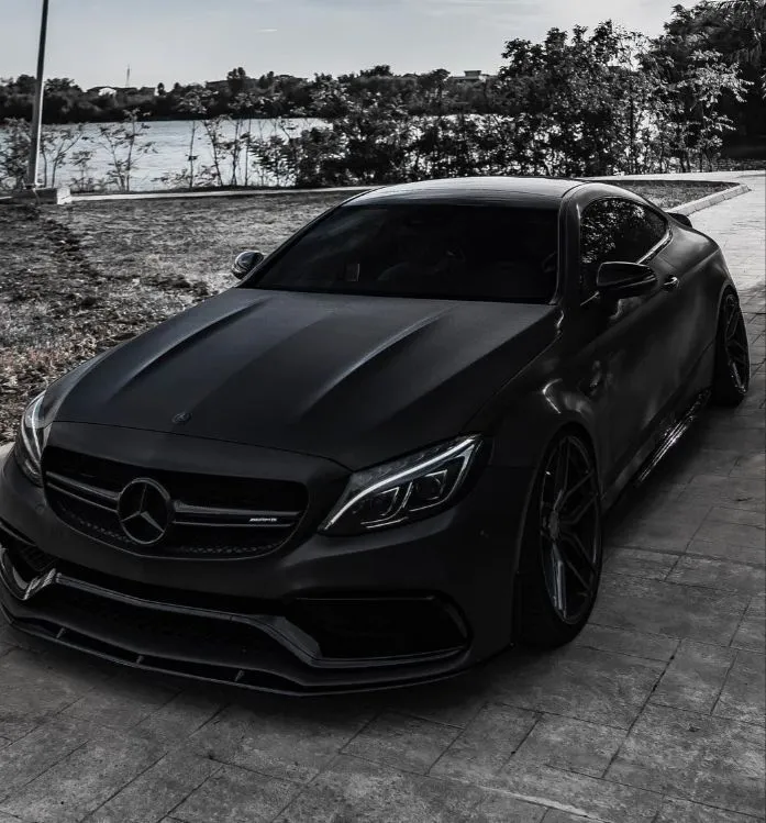 Matte Black Mercedes Coupe in Empty Concrete Lot image