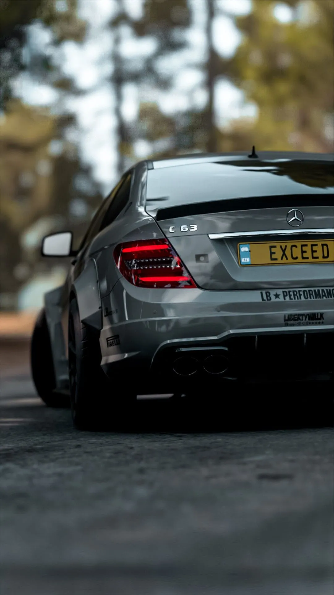 Mercedes AMG Captured from Rear on Forest Road image