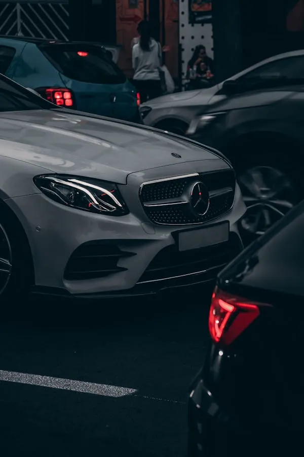 Mercedes Benz Cars Parked in Dimly Lit Garage Wallpaper