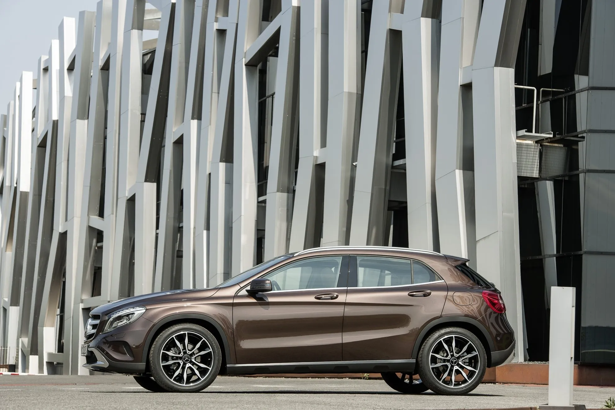 Mercedes Benz Crossover Parked by Modern City Building
