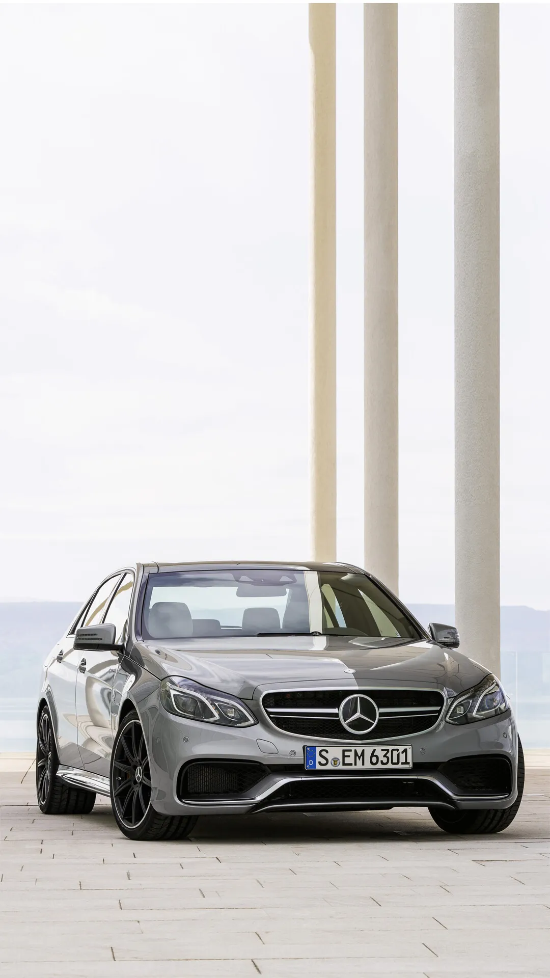 Mercedes Benz Elegant Car Parked by Architectural Columns