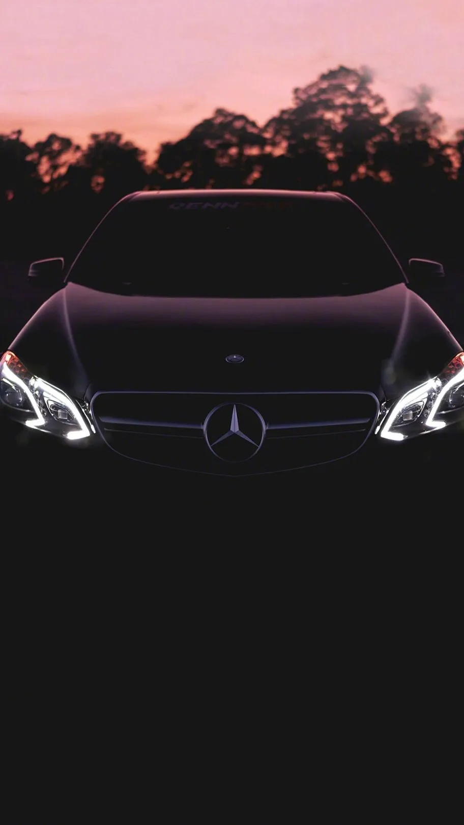 Mercedes Benz Front Lights Illuminated at Twilight Wallpaper
