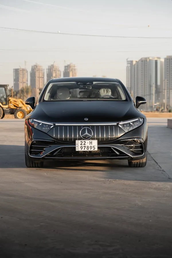 Mercedes Benz in Front of Modern Urban Buildings Wallpaper