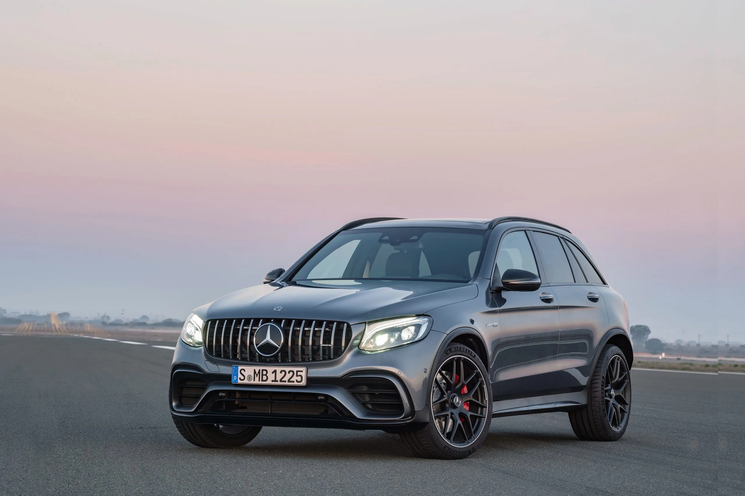 Mercedes Benz Performance SUV at Sunset on Open Road