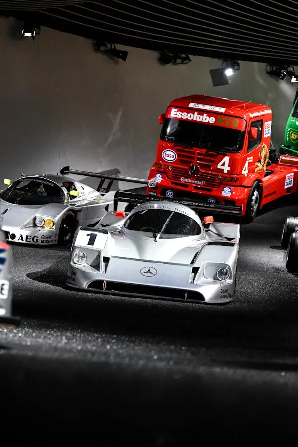 Mercedes Benz Race Cars on Display at Auto Show Wallpaper