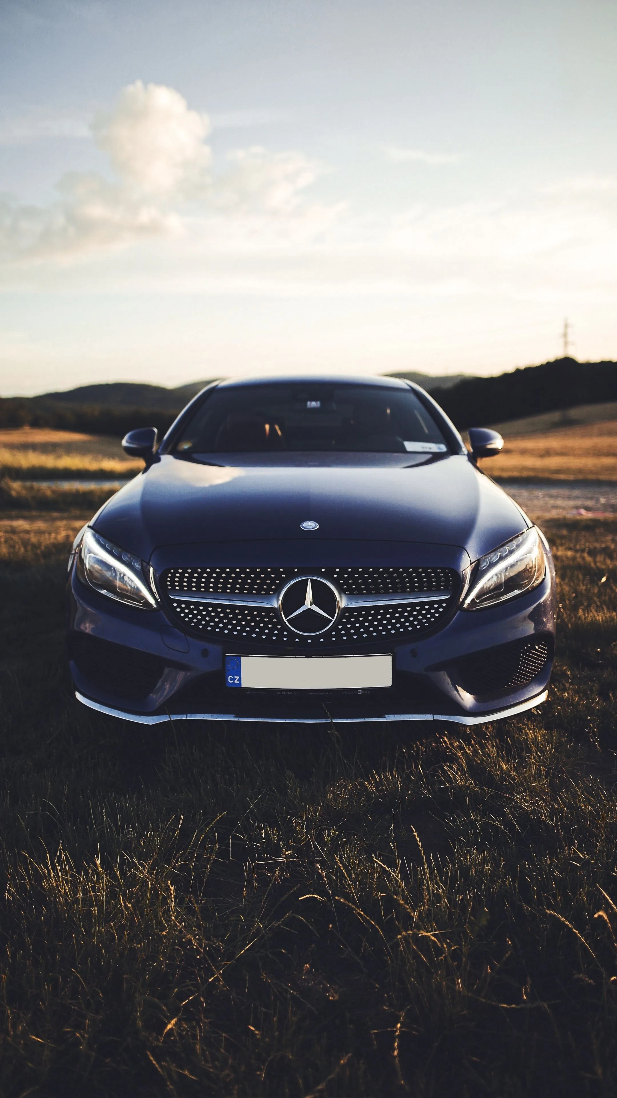 Mercedes Benz Sedan Front View in Golden Hour Wallpaper