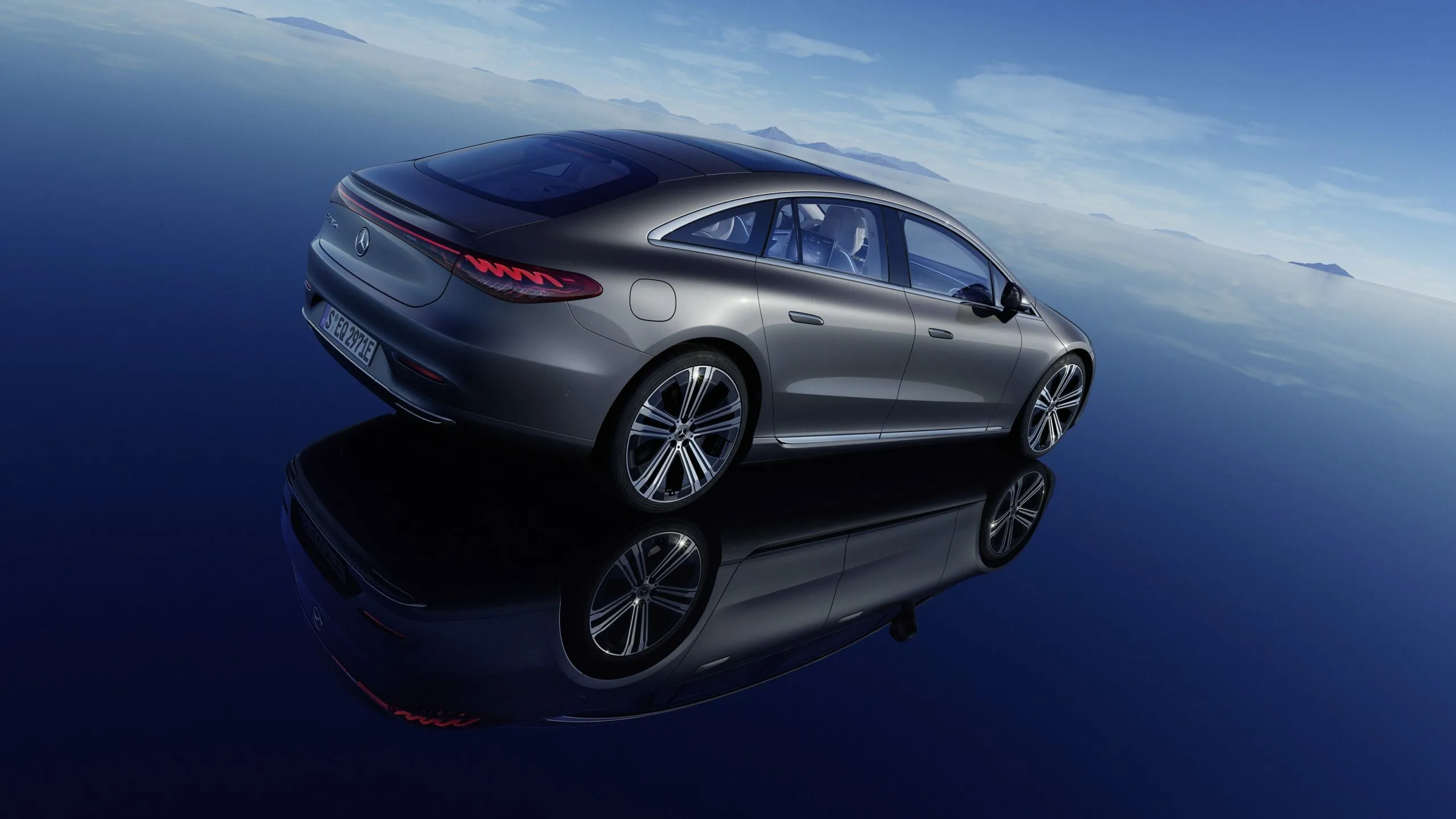Mercedes Benz Sedan Reflected on Glossy Surface image