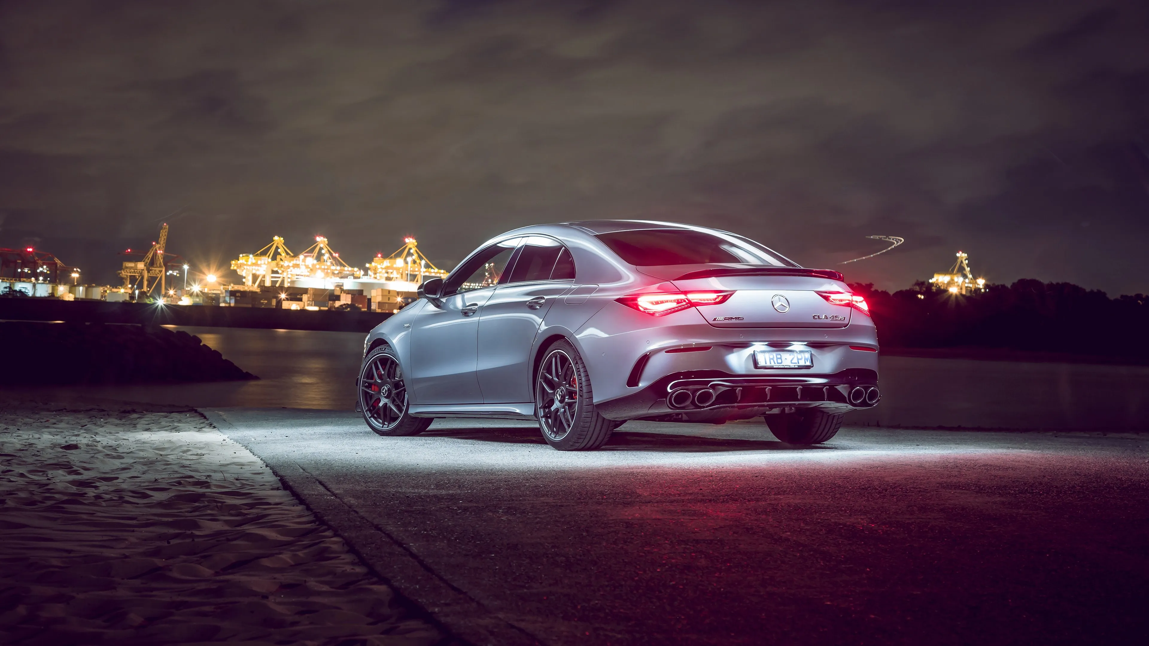 Mercedes Benz Silver Car Parked with City Lights Wallpaper