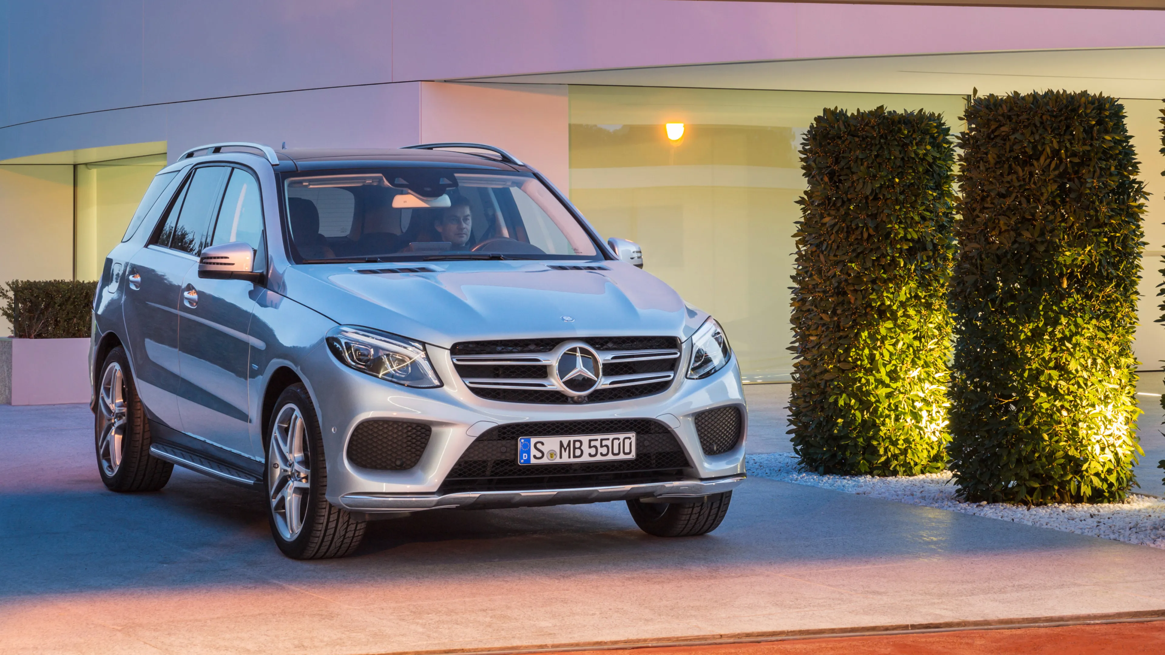 Mercedes Benz Silver SUV in Evening Light Setting image