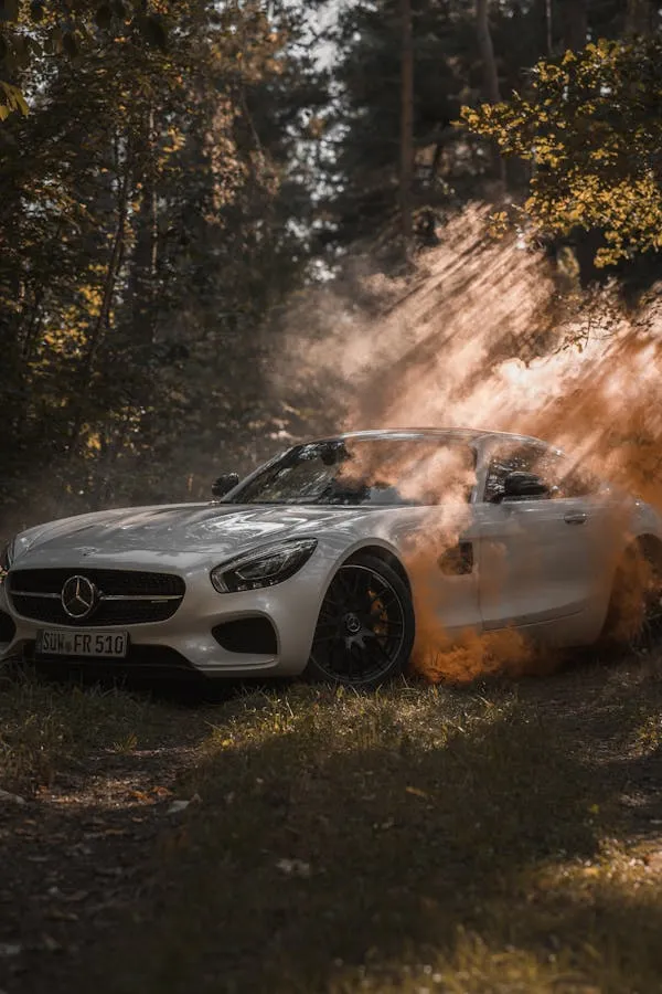 Mercedes Benz Sports Car Driving Through Dusty Forest
