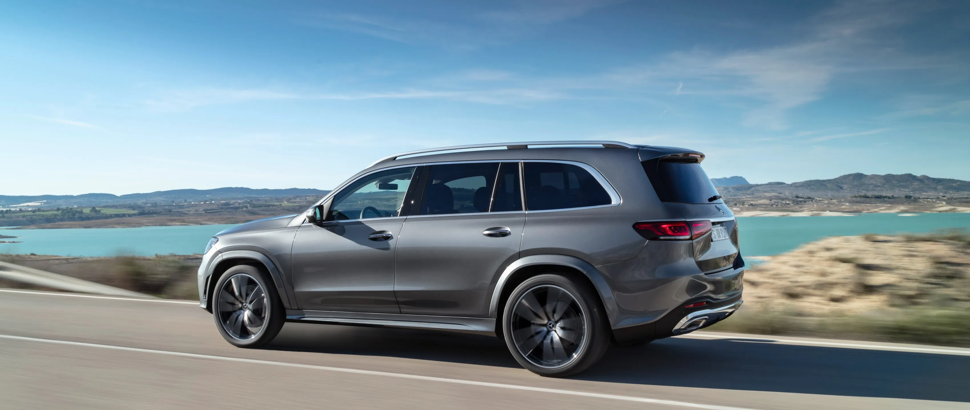 Mercedes Benz SUV Driving Along a Beachside Highway 4K