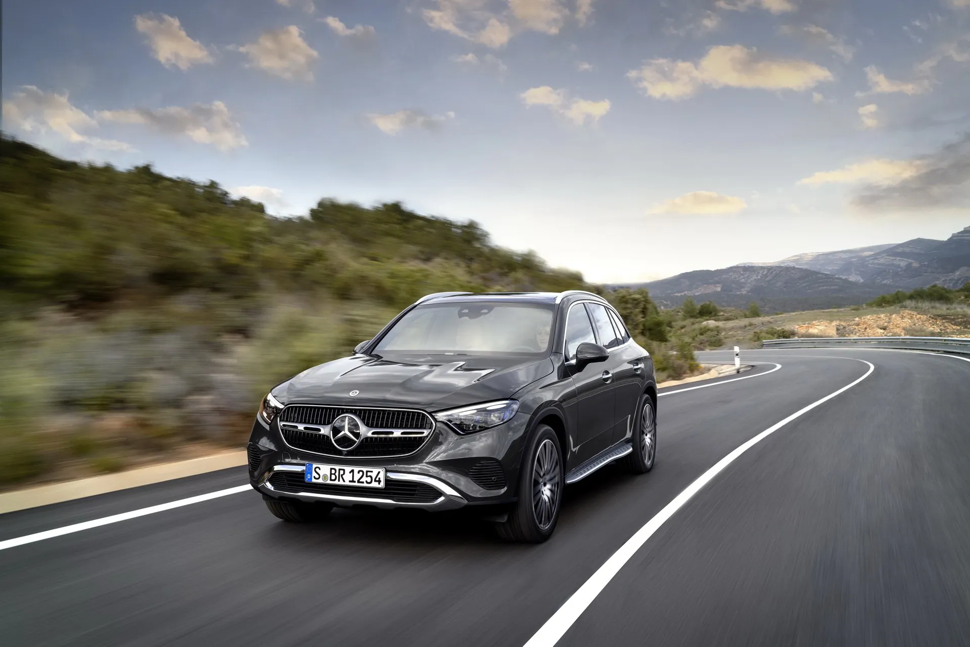 Mercedes Benz SUV Driving on Curvy Mountain Highway