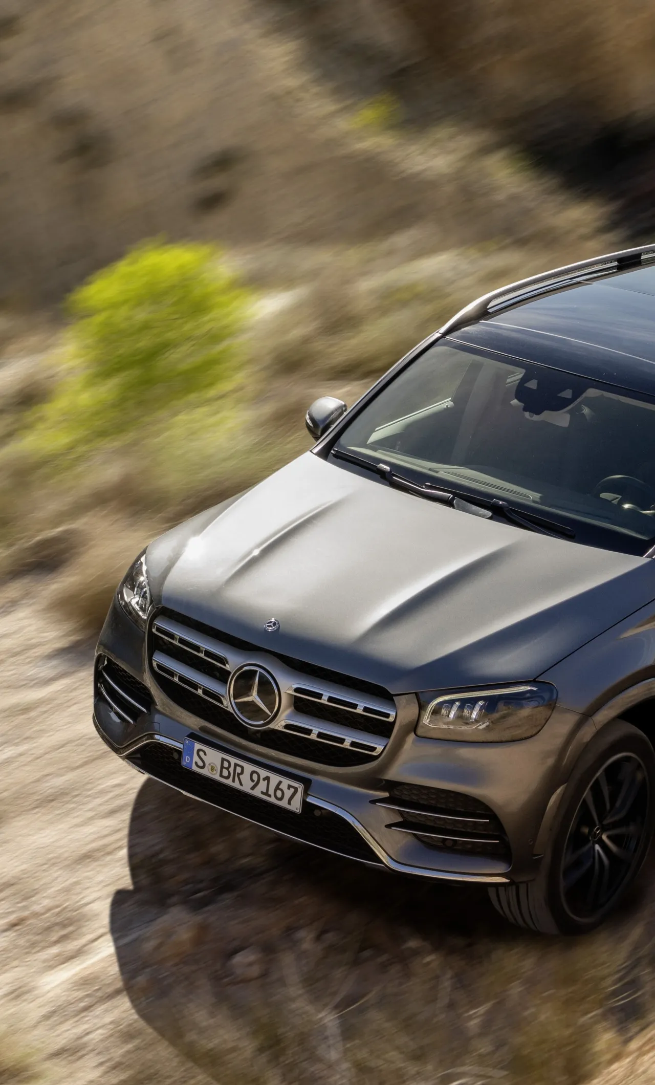 Mercedes Benz SUV Driving on Rocky Mountain TrailWallpaper