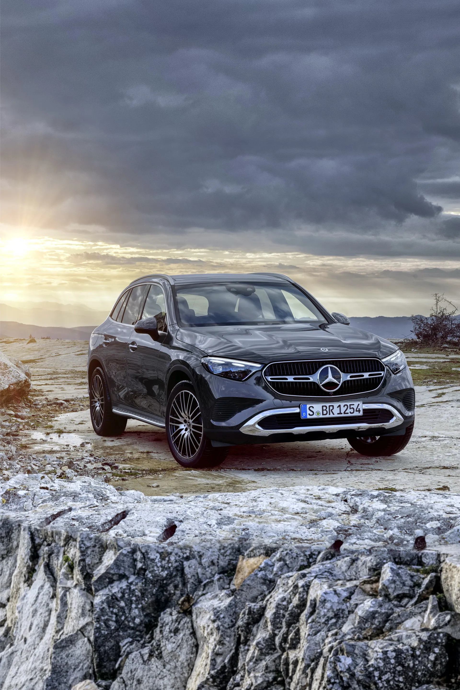 Mercedes Benz SUV Driving Through Rugged Mountain Terrain