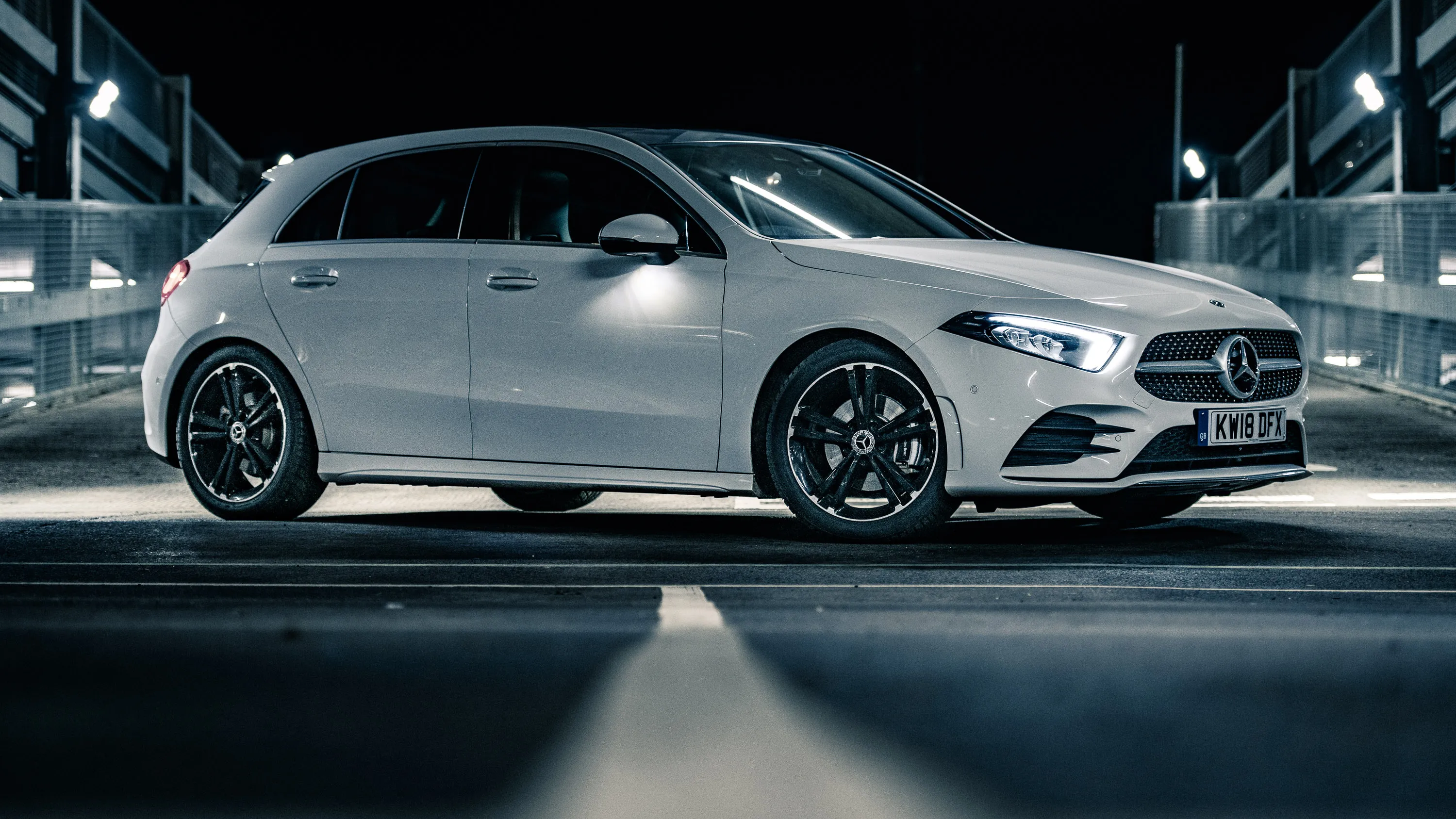 Mercedes Benz White Hatchback on City Night Road image