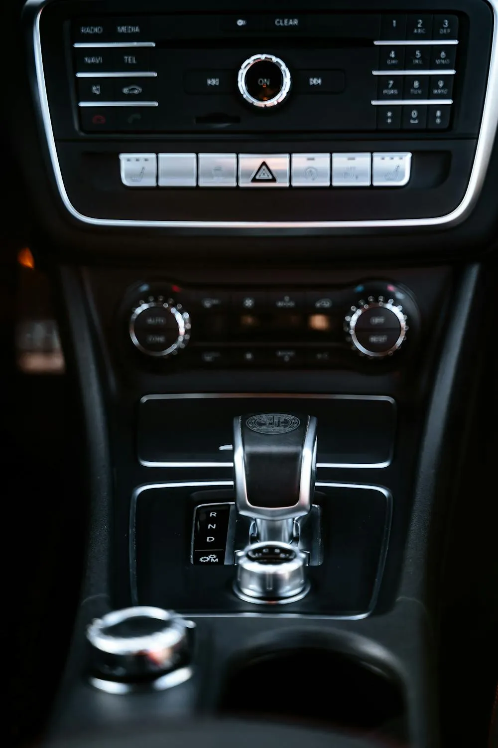 Mercedes Console View Showing Gear and Audio Controls