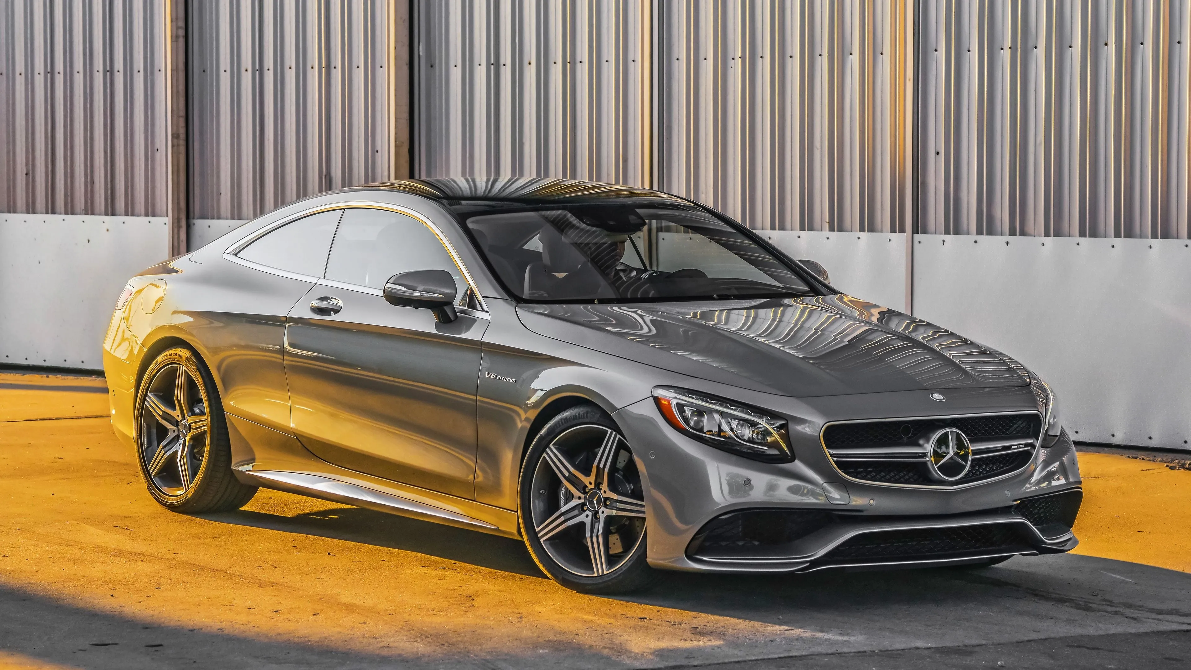 Mercedes Convertible Posed Beside Modern Wall Panels