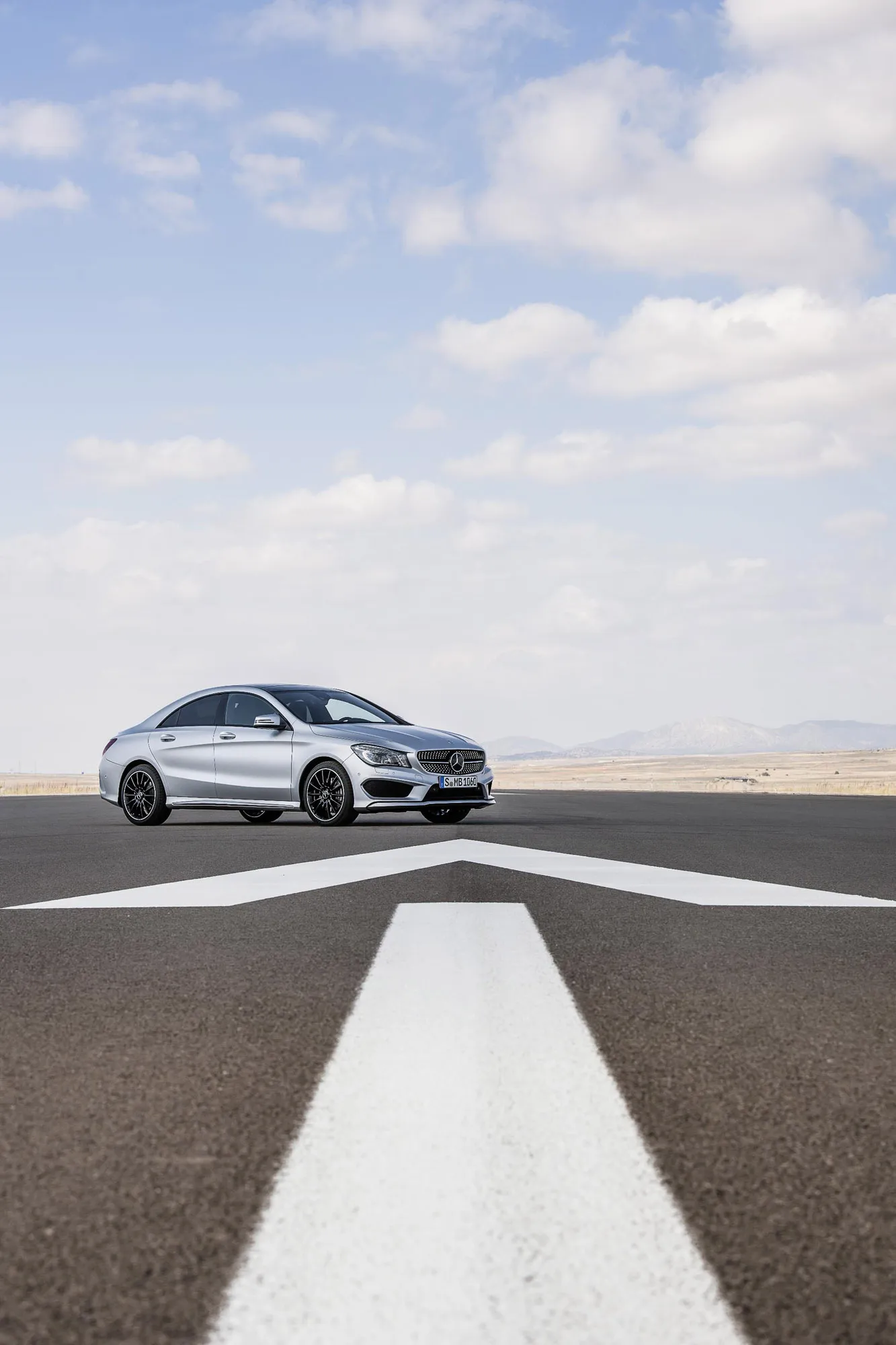Mercedes Driving Along a Desert Highway Runway image