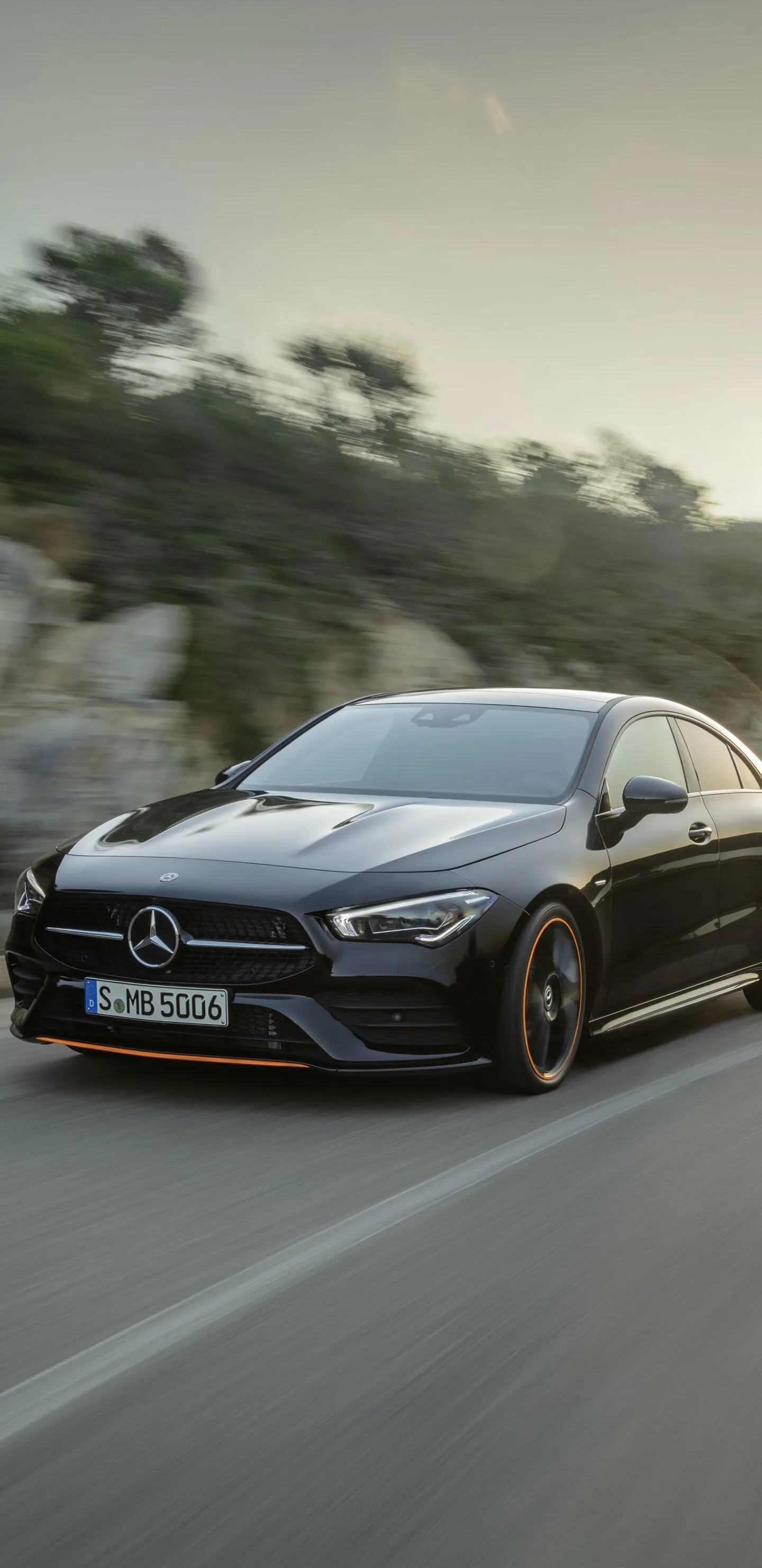 Mercedes Driving On A Country Road At Sunset free Wallpaper
