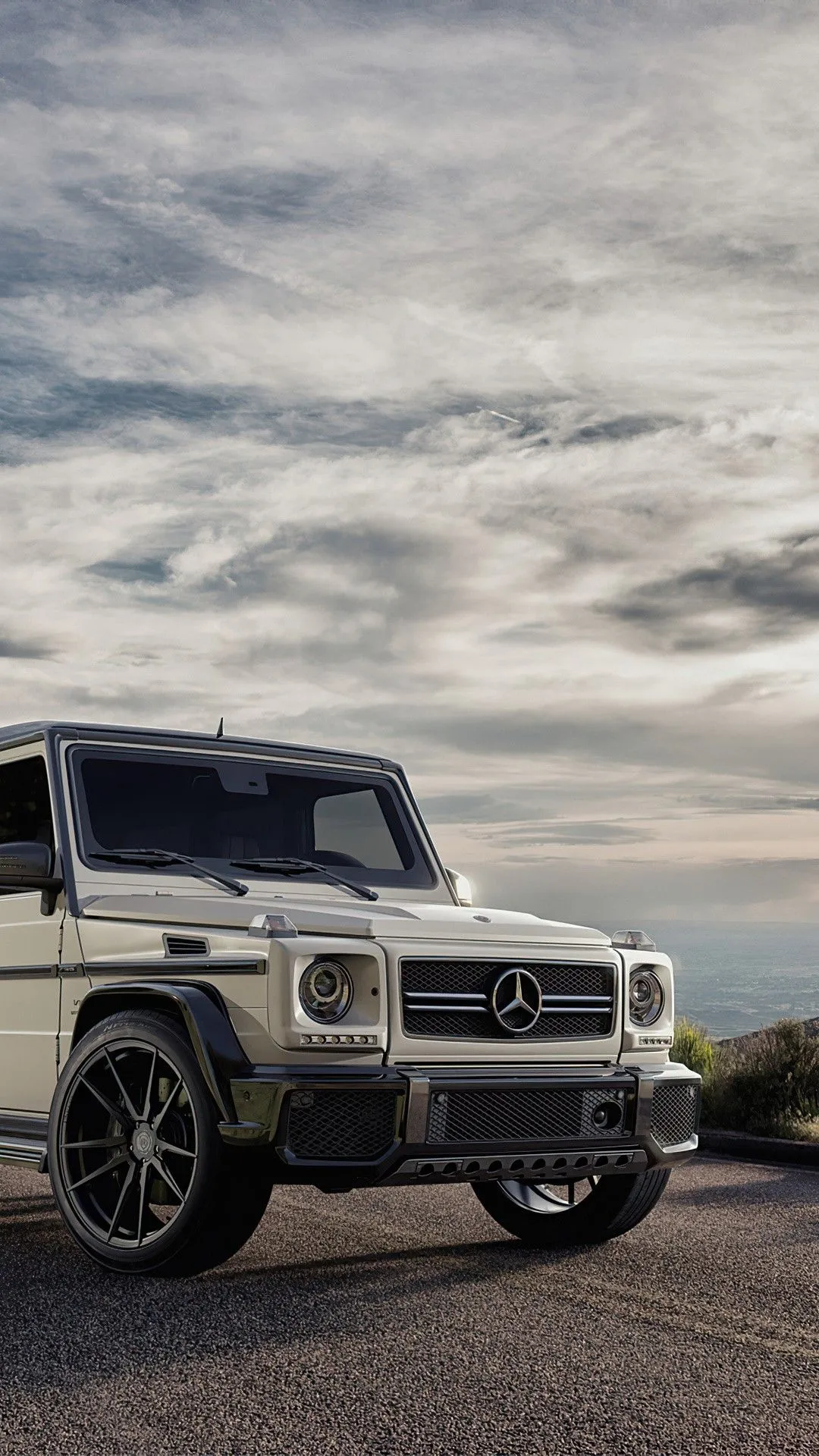 Mercedes G Wagon on Rugged Landscape at Sunrise Wallpaper
