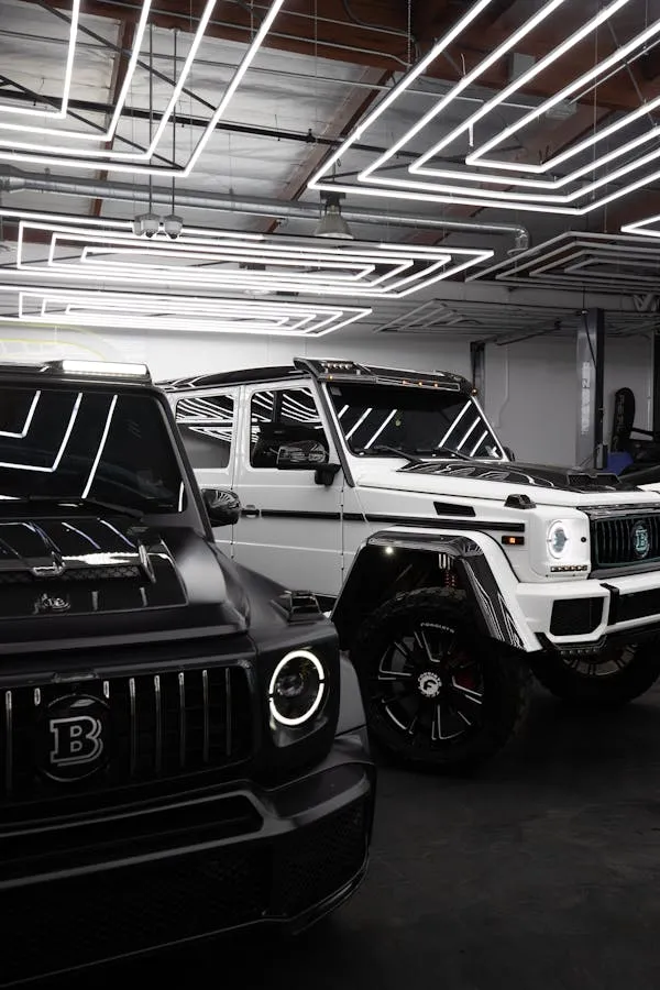 Mercedes G Wagons parked in luxury indoor showroom image