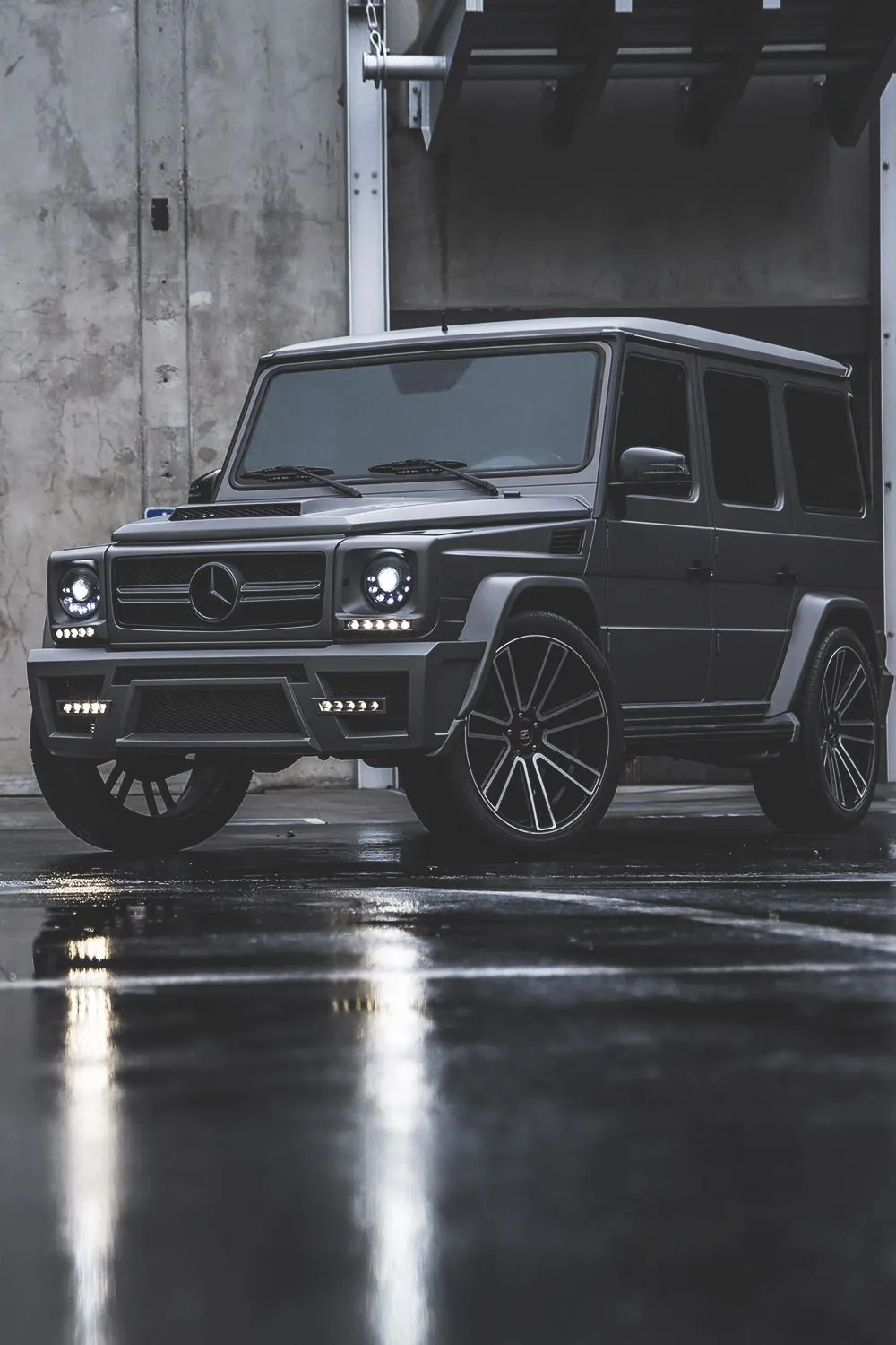 Mercedes GClass in Wet Urban Nighttime Scene Wallpaper
