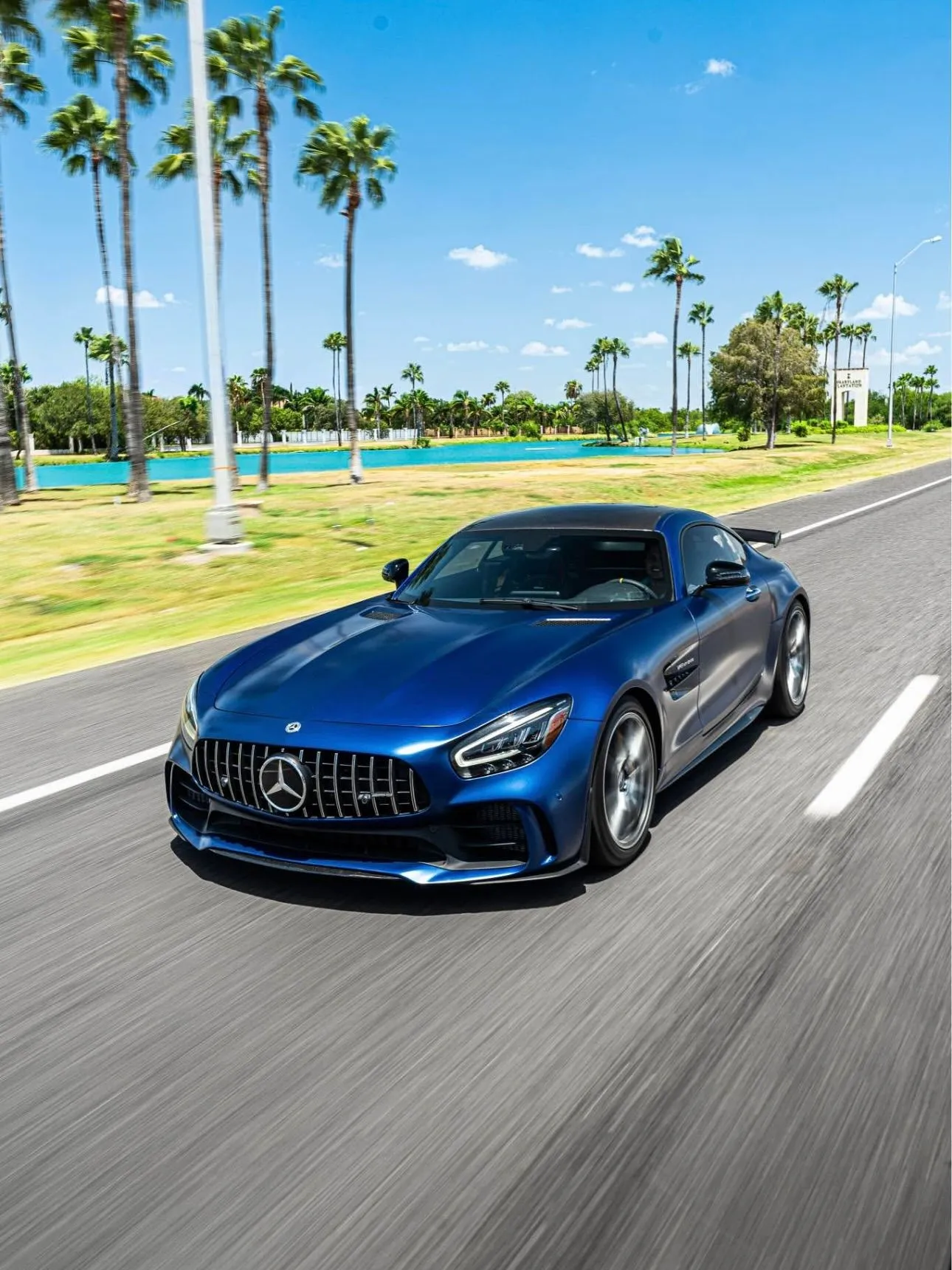 Mercedes Sports Car Speeding Past Palm Tree Road Wallpaper